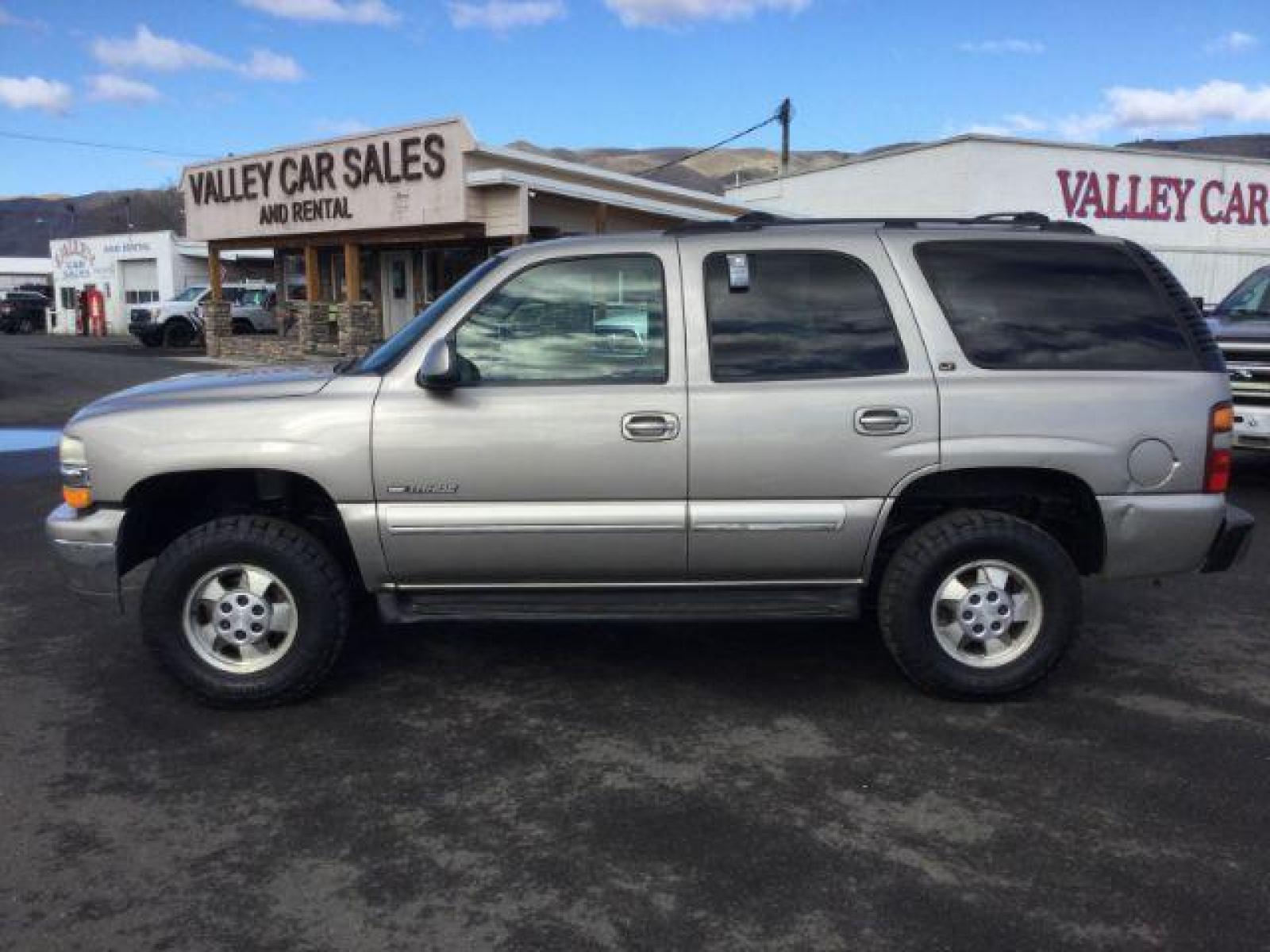 2002 Light Pewter Metallic /Tan/Neutral Custom Leather Interior Chevrolet Tahoe 4WD (1GNEK13Z62J) with an 5.3L V8 OHV 16V FFV engine, 4-Speed Automatic transmission, located at 1801 Main Street, Lewiston, 83501, (208) 743-9371, 46.417065, -117.004799 - Photo #1