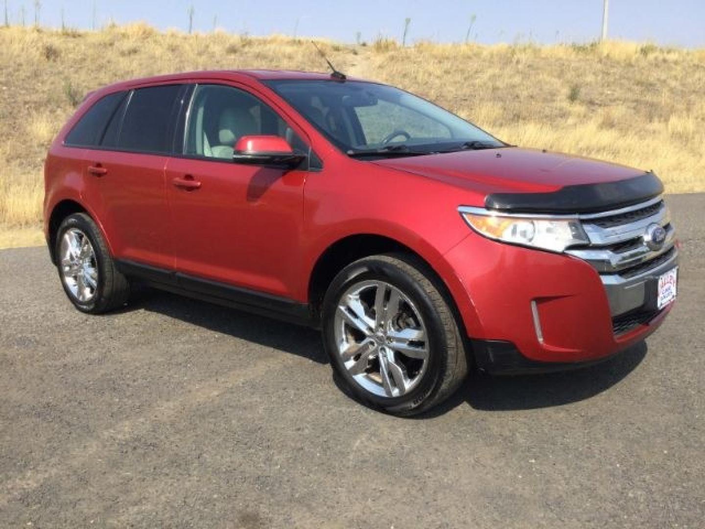 2012 Red Candy Metallic /Medium Light Stone Leather Interior Ford Edge SEL AWD (2FMDK4JC5CB) with an 3.5L V6 DOHC 24V engine, 6-Speed Automatic transmission, located at 1801 Main Street, Lewiston, 83501, (208) 743-9371, 46.417065, -117.004799- Photo#1