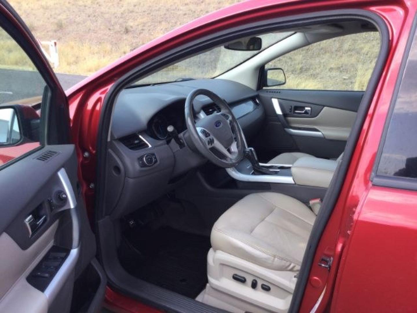 2012 Red Candy Metallic /Medium Light Stone Leather Interior Ford Edge SEL AWD (2FMDK4JC5CB) with an 3.5L V6 DOHC 24V engine, 6-Speed Automatic transmission, located at 1801 Main Street, Lewiston, 83501, (208) 743-9371, 46.417065, -117.004799- Photo#4