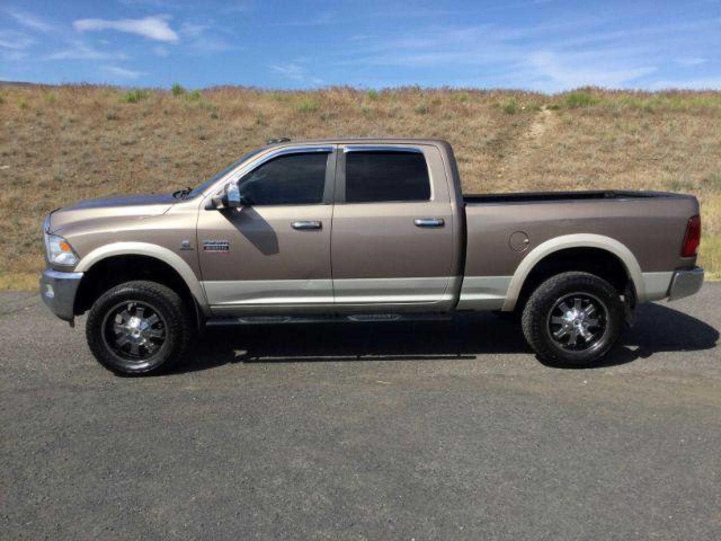 2010 Austin Tan Pearl/Light Graystone Pearl /Light Pebble Beige/Bark Brown Leather Interior RAM 2500 Laramie Crew Cab SWB 4WD (3D7UT2CL7AG) with an 6.7L L6 OHV 24V TURBO DIESEL engine, 6-SPEED AUTOMATIC transmission, located at 1801 Main Street, Lewiston, 83501, (208) 743-9371, 46.417065, -117.004799 - Photo#1