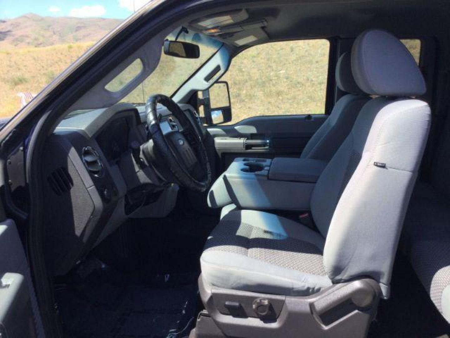2011 Dark Blue Pearl /Steel Cloth Interior Ford F-350 SD XLT SuperCab 4WD (1FT8X3BT0BE) with an 6.7L V8 OHV 16V DIESEL engine, 6-Speed Automatic transmission, located at 1801 Main Street, Lewiston, 83501, (208) 743-9371, 46.417065, -117.004799 - Photo#3