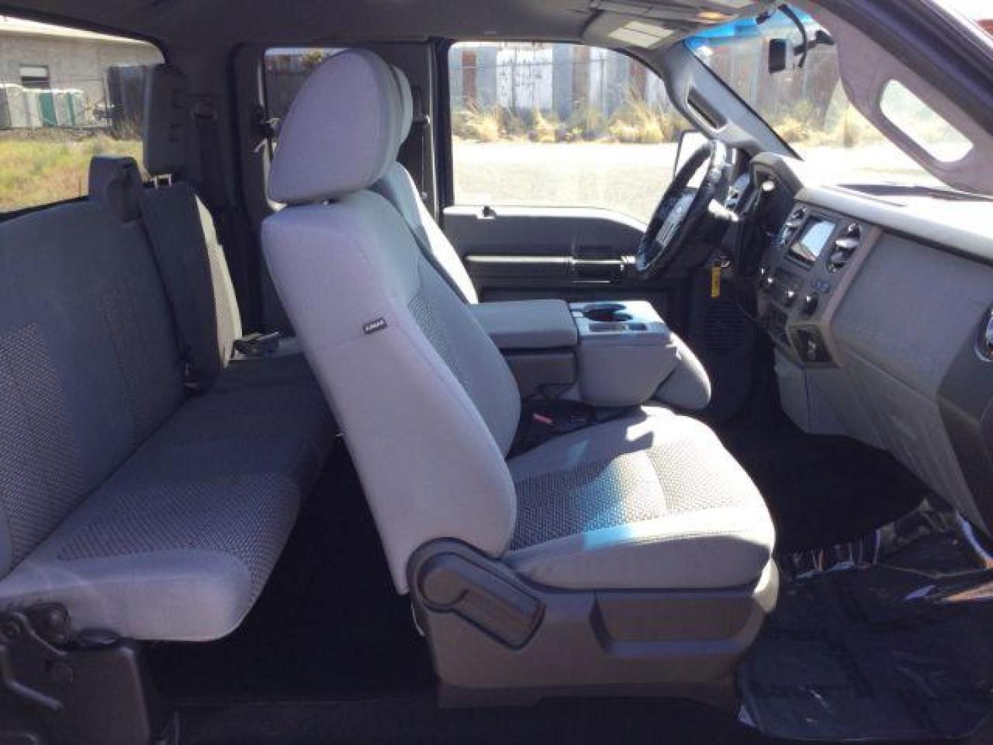 2011 Dark Blue Pearl /Steel Cloth Interior Ford F-350 SD XLT SuperCab 4WD (1FT8X3BT0BE) with an 6.7L V8 OHV 16V DIESEL engine, 6-Speed Automatic transmission, located at 1801 Main Street, Lewiston, 83501, (208) 743-9371, 46.417065, -117.004799 - Photo#10