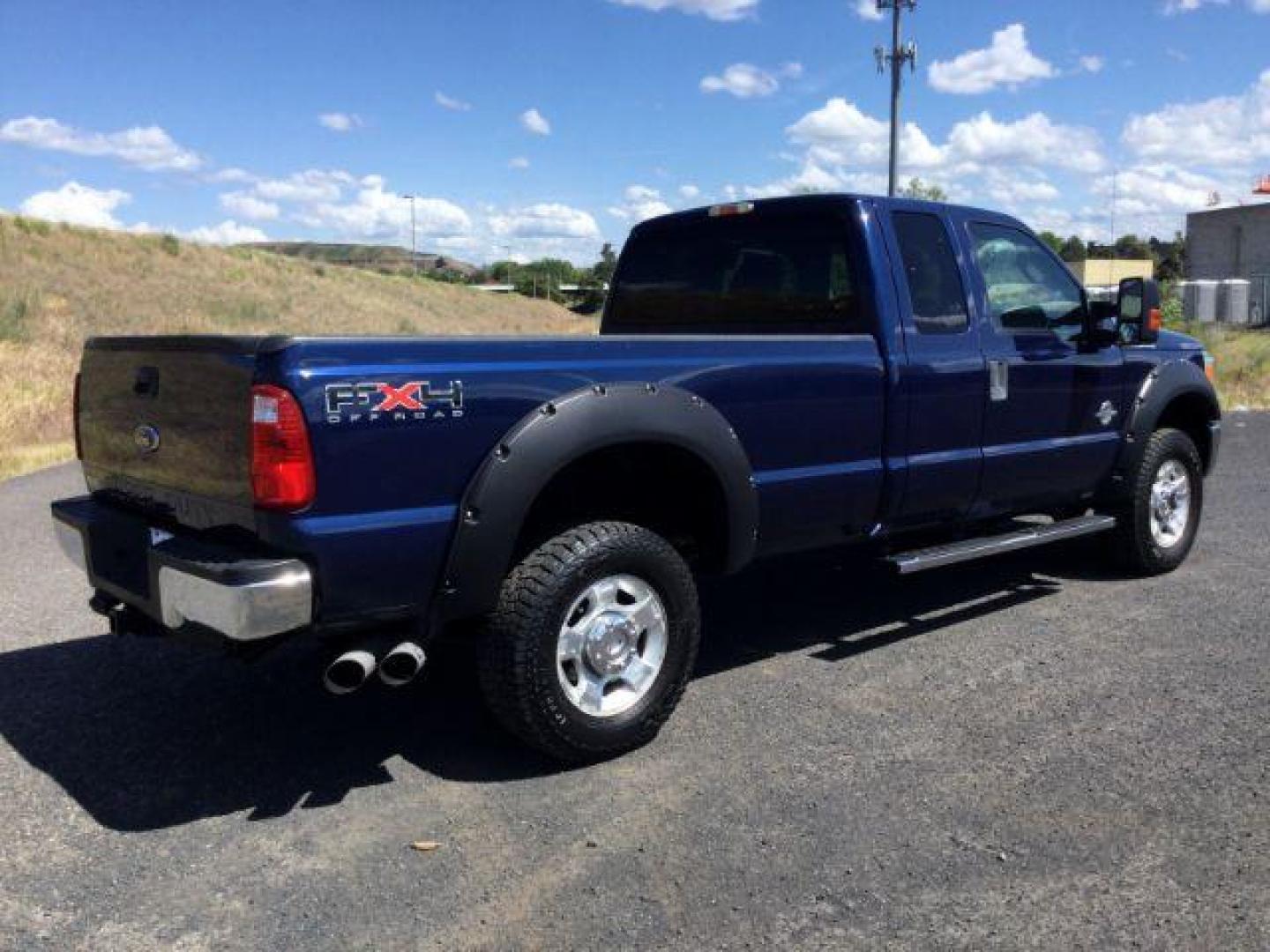 2011 Dark Blue Pearl /Steel Cloth Interior Ford F-350 SD XLT SuperCab 4WD (1FT8X3BT0BE) with an 6.7L V8 OHV 16V DIESEL engine, 6-Speed Automatic transmission, located at 1801 Main Street, Lewiston, 83501, (208) 743-9371, 46.417065, -117.004799 - Photo#15