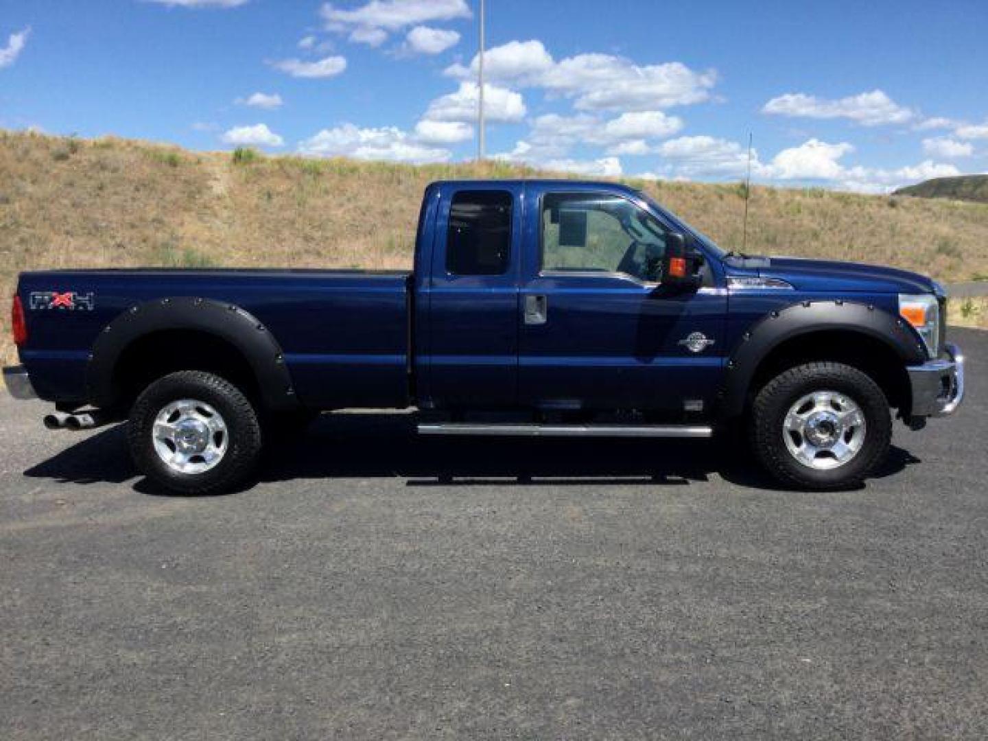 2011 Dark Blue Pearl /Steel Cloth Interior Ford F-350 SD XLT SuperCab 4WD (1FT8X3BT0BE) with an 6.7L V8 OHV 16V DIESEL engine, 6-Speed Automatic transmission, located at 1801 Main Street, Lewiston, 83501, (208) 743-9371, 46.417065, -117.004799 - Photo#16