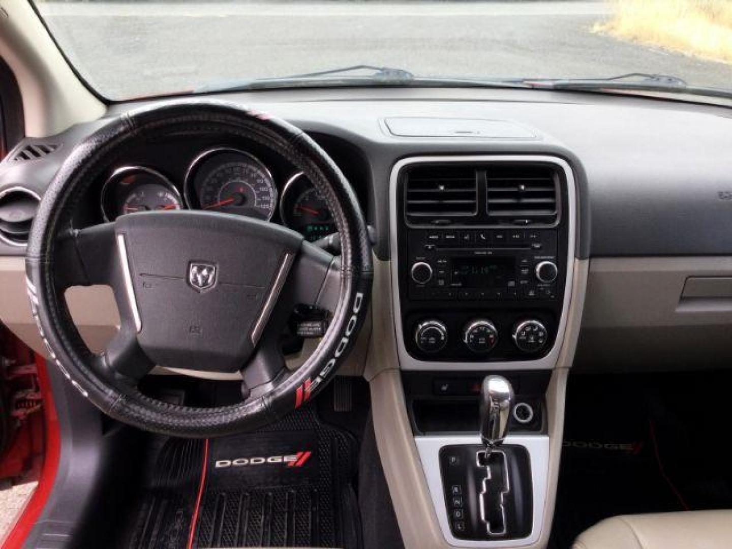 2010 Inferno Red Crystal Pearlcoat /Dark Slate/Medium Graystone Leather Interior Dodge Caliber Uptown (1B3CB9HB9AD) with an 2.4L L4 DOHC 16V engine, Continuously Variable Transmission transmission, located at 1801 Main Street, Lewiston, 83501, (208) 743-9371, 46.417065, -117.004799 - Photo#6