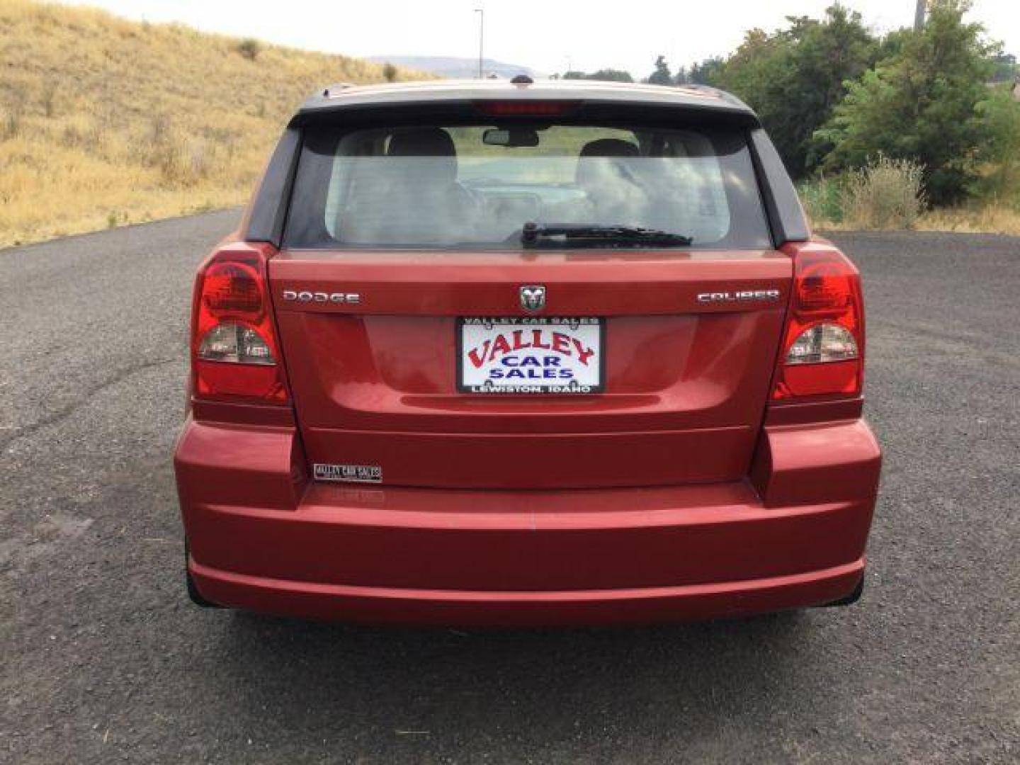 2010 Inferno Red Crystal Pearlcoat /Dark Slate/Medium Graystone Leather Interior Dodge Caliber Uptown (1B3CB9HB9AD) with an 2.4L L4 DOHC 16V engine, Continuously Variable Transmission transmission, located at 1801 Main Street, Lewiston, 83501, (208) 743-9371, 46.417065, -117.004799 - Photo#12