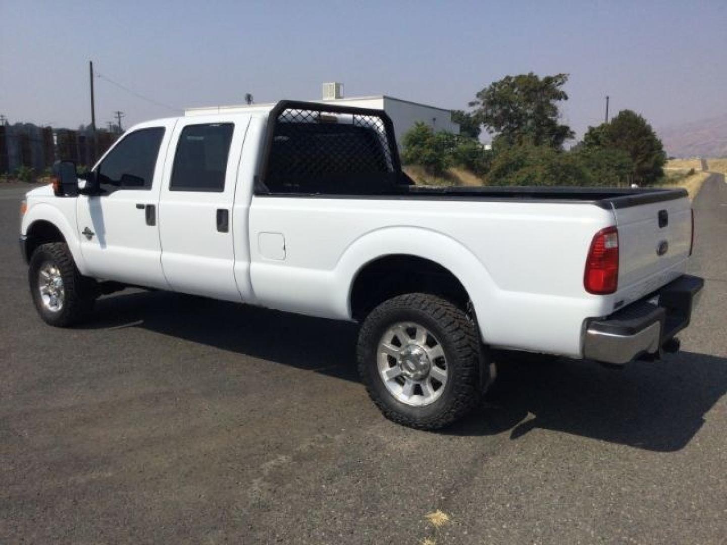2012 Oxford White /Steel Cloth Interior Ford F-350 SD XLT Crew Cab Long Bed 4WD (1FT8W3BT9CE) with an 6.7L V8 OHV 16V DIESEL engine, 6-Speed Automatic transmission, located at 1801 Main Street, Lewiston, 83501, (208) 743-9371, 46.417065, -117.004799- Photo#3