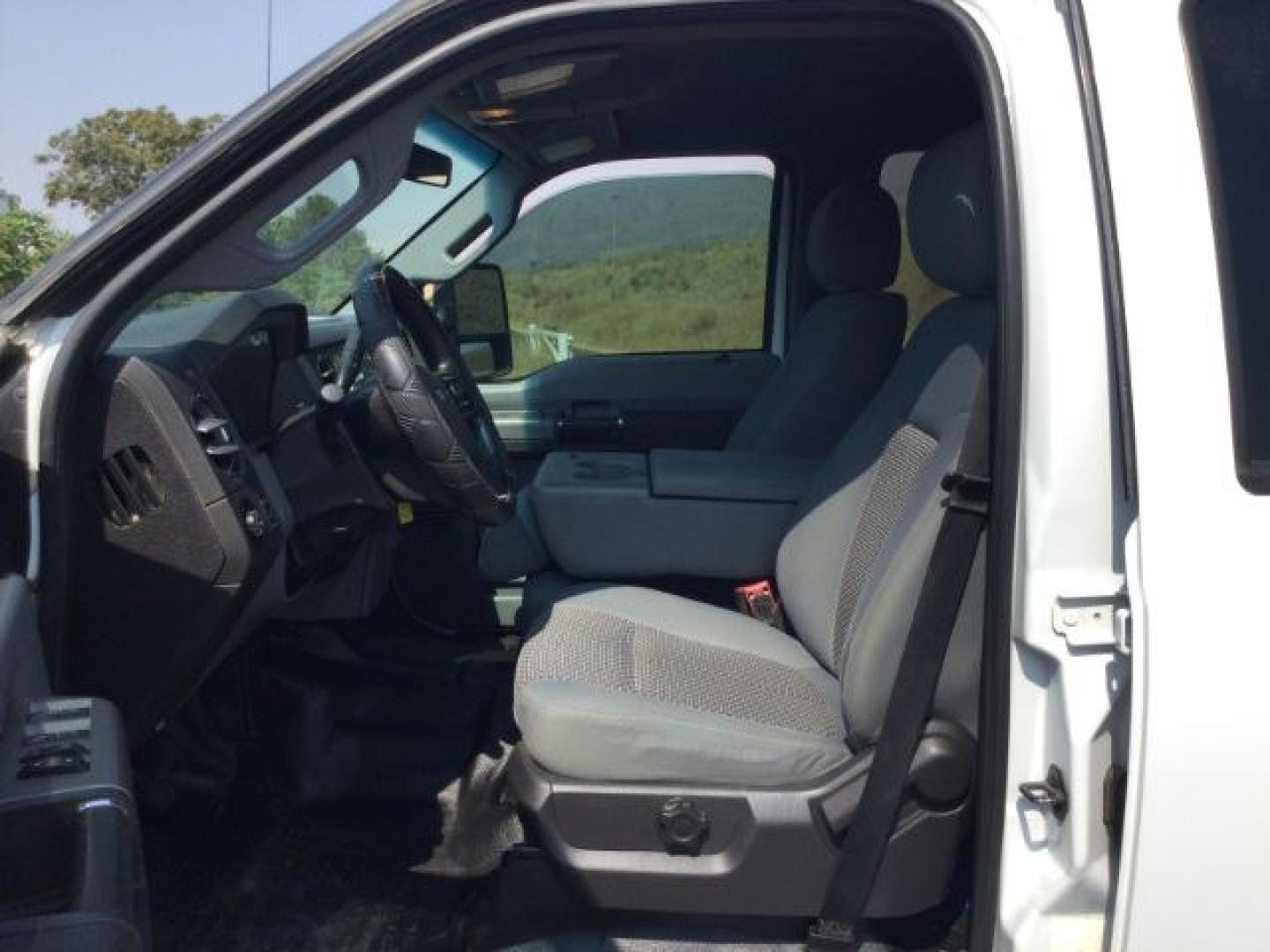 2012 Oxford White /Steel Cloth Interior Ford F-350 SD XLT Crew Cab Long Bed 4WD (1FT8W3BT9CE) with an 6.7L V8 OHV 16V DIESEL engine, 6-Speed Automatic transmission, located at 1801 Main Street, Lewiston, 83501, (208) 743-9371, 46.417065, -117.004799- Photo#4