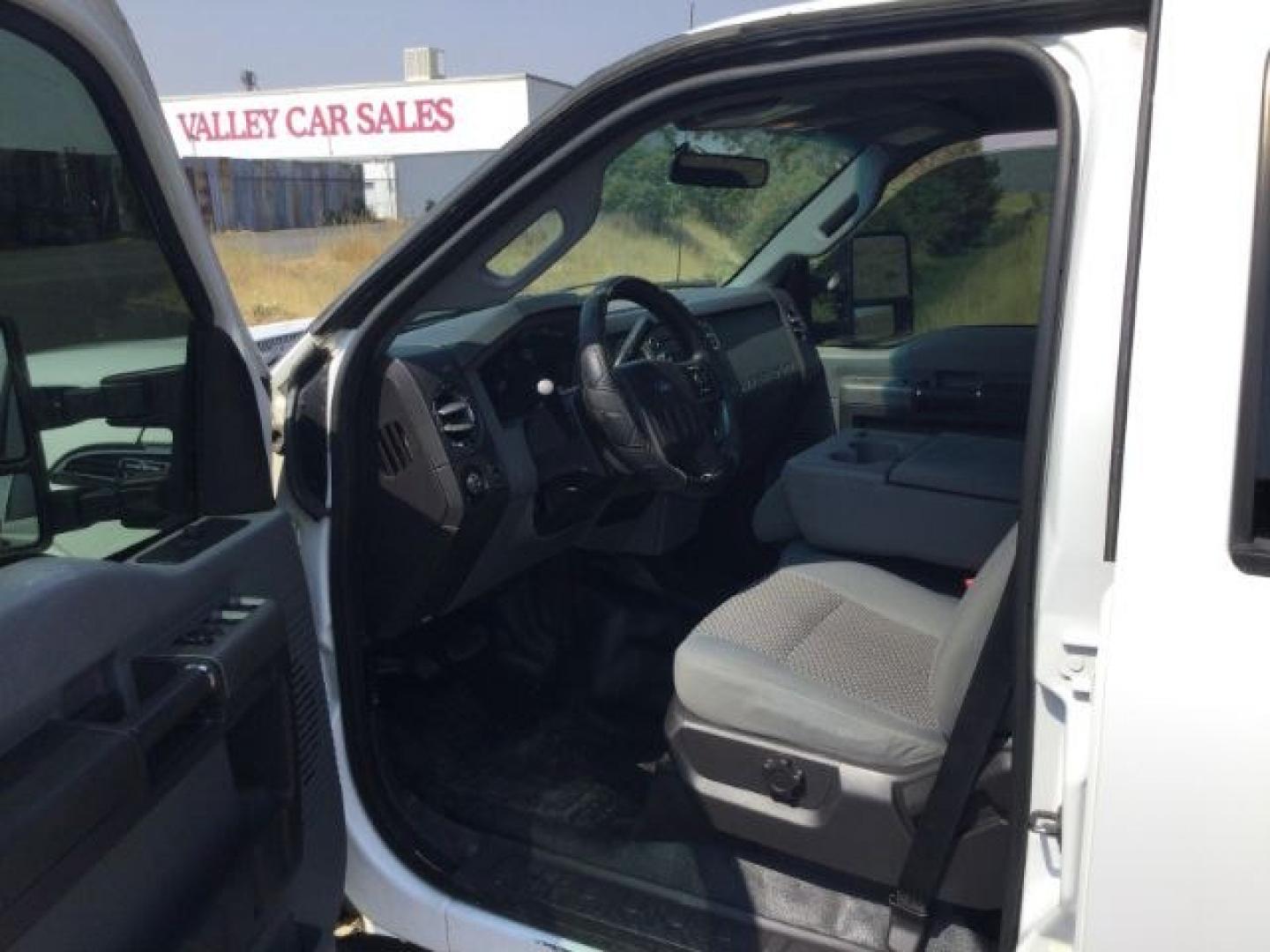 2012 Oxford White /Steel Cloth Interior Ford F-350 SD XLT Crew Cab Long Bed 4WD (1FT8W3BT9CE) with an 6.7L V8 OHV 16V DIESEL engine, 6-Speed Automatic transmission, located at 1801 Main Street, Lewiston, 83501, (208) 743-9371, 46.417065, -117.004799- Photo#5