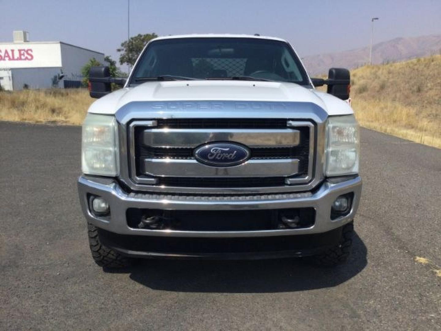 2012 Oxford White /Steel Cloth Interior Ford F-350 SD XLT Crew Cab Long Bed 4WD (1FT8W3BT9CE) with an 6.7L V8 OHV 16V DIESEL engine, 6-Speed Automatic transmission, located at 1801 Main Street, Lewiston, 83501, (208) 743-9371, 46.417065, -117.004799- Photo#9