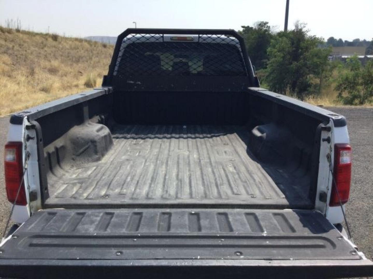 2012 Oxford White /Steel Cloth Interior Ford F-350 SD XLT Crew Cab Long Bed 4WD (1FT8W3BT9CE) with an 6.7L V8 OHV 16V DIESEL engine, 6-Speed Automatic transmission, located at 1801 Main Street, Lewiston, 83501, (208) 743-9371, 46.417065, -117.004799- Photo#14