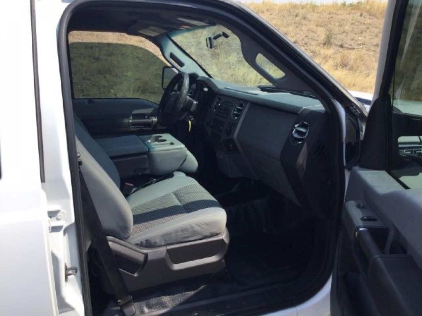 2012 Oxford White /Steel Cloth Interior Ford F-350 SD XLT Crew Cab Long Bed 4WD (1FT8W3BT9CE) with an 6.7L V8 OHV 16V DIESEL engine, 6-Speed Automatic transmission, located at 1801 Main Street, Lewiston, 83501, (208) 743-9371, 46.417065, -117.004799- Photo#16