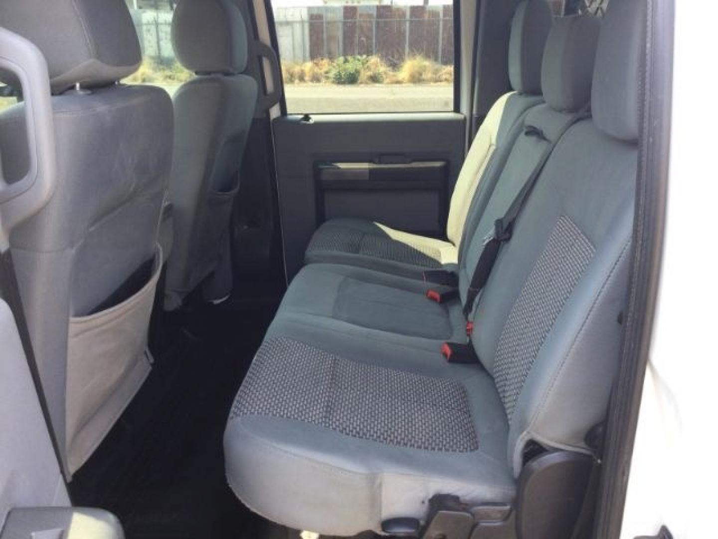 2012 Oxford White /Steel Cloth Interior Ford F-350 SD XLT Crew Cab Long Bed 4WD (1FT8W3BT9CE) with an 6.7L V8 OHV 16V DIESEL engine, 6-Speed Automatic transmission, located at 1801 Main Street, Lewiston, 83501, (208) 743-9371, 46.417065, -117.004799- Photo#18