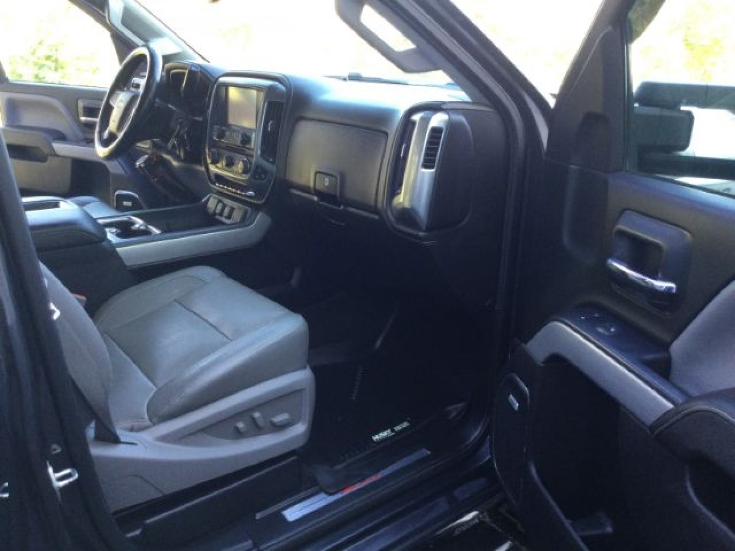 2015 Tungsten Metallic /Jet Black/Dark Ash Chevrolet Silverado 3500HD LTZ Crew Cab 4WD (1GC4K0C80FF) with an 6.6L V8 OHV 32V TURBO DIESEL engine, 6-Speed Automatic transmission, located at 1801 Main Street, Lewiston, 83501, (208) 743-9371, 46.417065, -117.004799- Photo#5