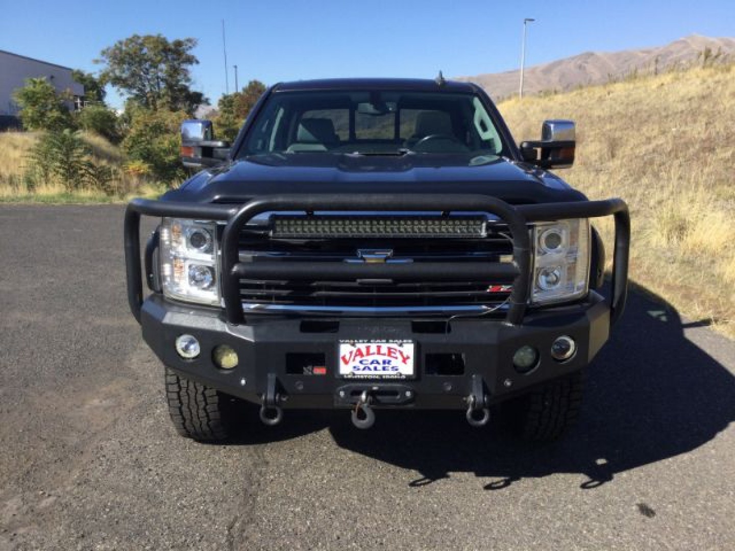 2015 Tungsten Metallic /Jet Black/Dark Ash Chevrolet Silverado 3500HD LTZ Crew Cab 4WD (1GC4K0C80FF) with an 6.6L V8 OHV 32V TURBO DIESEL engine, 6-Speed Automatic transmission, located at 1801 Main Street, Lewiston, 83501, (208) 743-9371, 46.417065, -117.004799- Photo#16