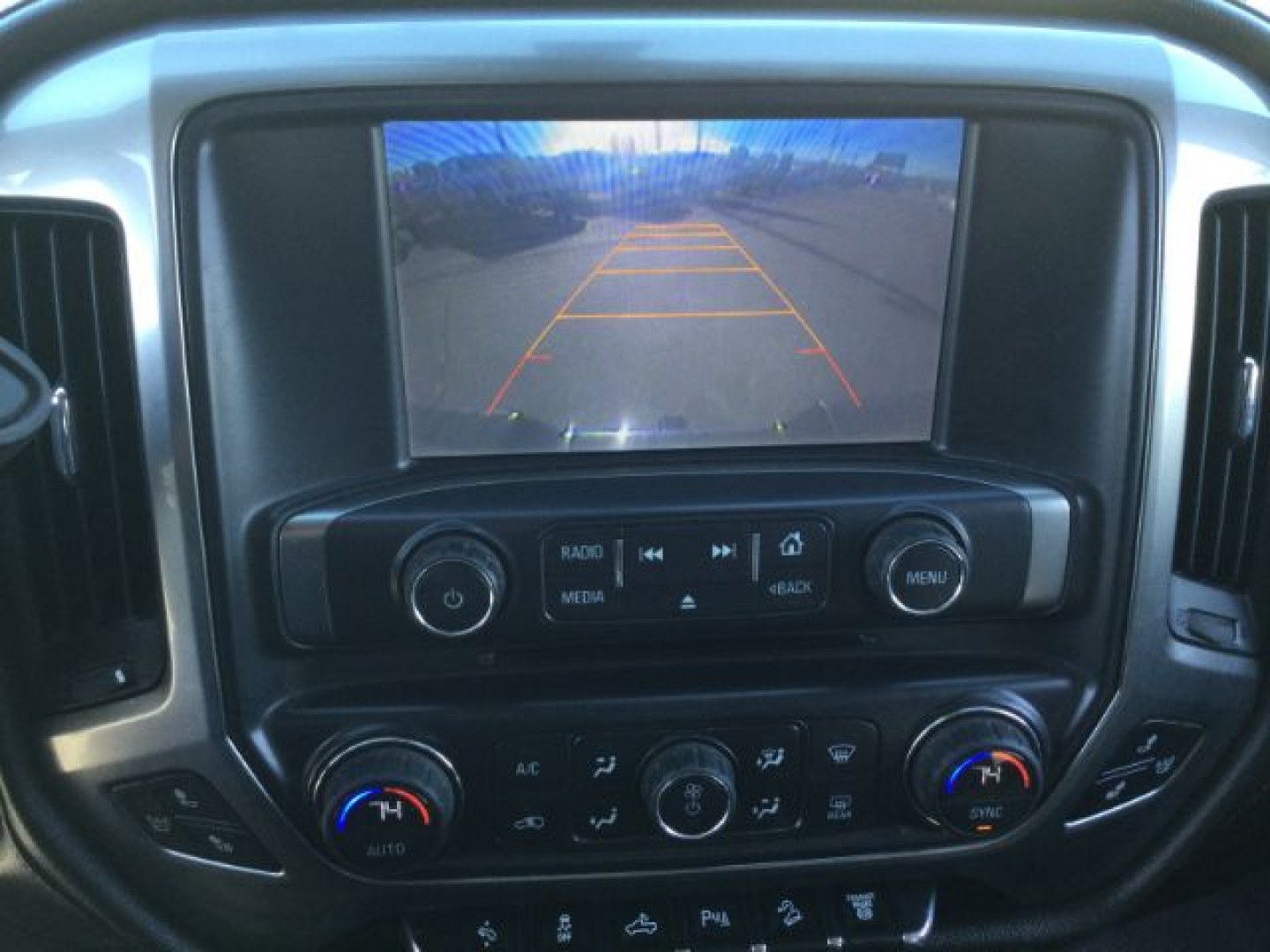 2015 Tungsten Metallic /Jet Black/Dark Ash Chevrolet Silverado 3500HD LTZ Crew Cab 4WD (1GC4K0C80FF) with an 6.6L V8 OHV 32V TURBO DIESEL engine, 6-Speed Automatic transmission, located at 1801 Main Street, Lewiston, 83501, (208) 743-9371, 46.417065, -117.004799- Photo#18