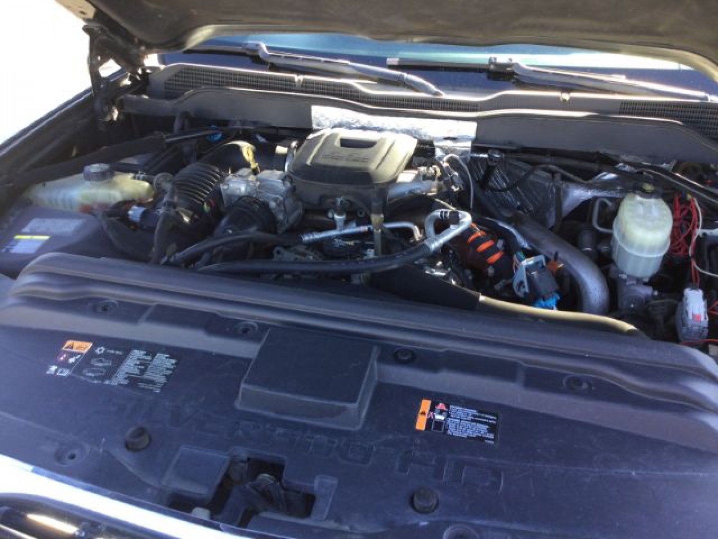 2015 Tungsten Metallic /Jet Black/Dark Ash Chevrolet Silverado 3500HD LTZ Crew Cab 4WD (1GC4K0C80FF) with an 6.6L V8 OHV 32V TURBO DIESEL engine, 6-Speed Automatic transmission, located at 1801 Main Street, Lewiston, 83501, (208) 743-9371, 46.417065, -117.004799- Photo#19