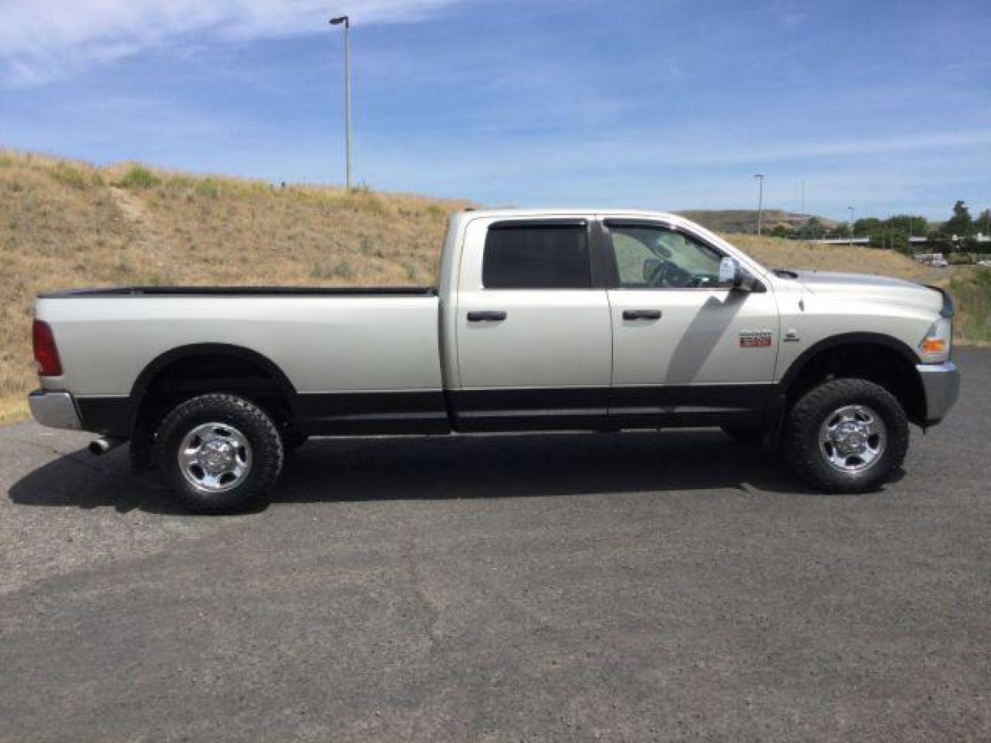 2010 Light Graystone Pearl /Dark Slate/Medium Graystone Cloth Interior RAM 3500 SLT Crew Cab LWB 4WD (3D73Y3CL8AG) with an 6.7L L6 OHV 24V TURBO DIESEL engine, 6-Speed Automatic transmission, located at 1801 Main Street, Lewiston, 83501, (208) 743-9371, 46.417065, -117.004799 - Photo#11