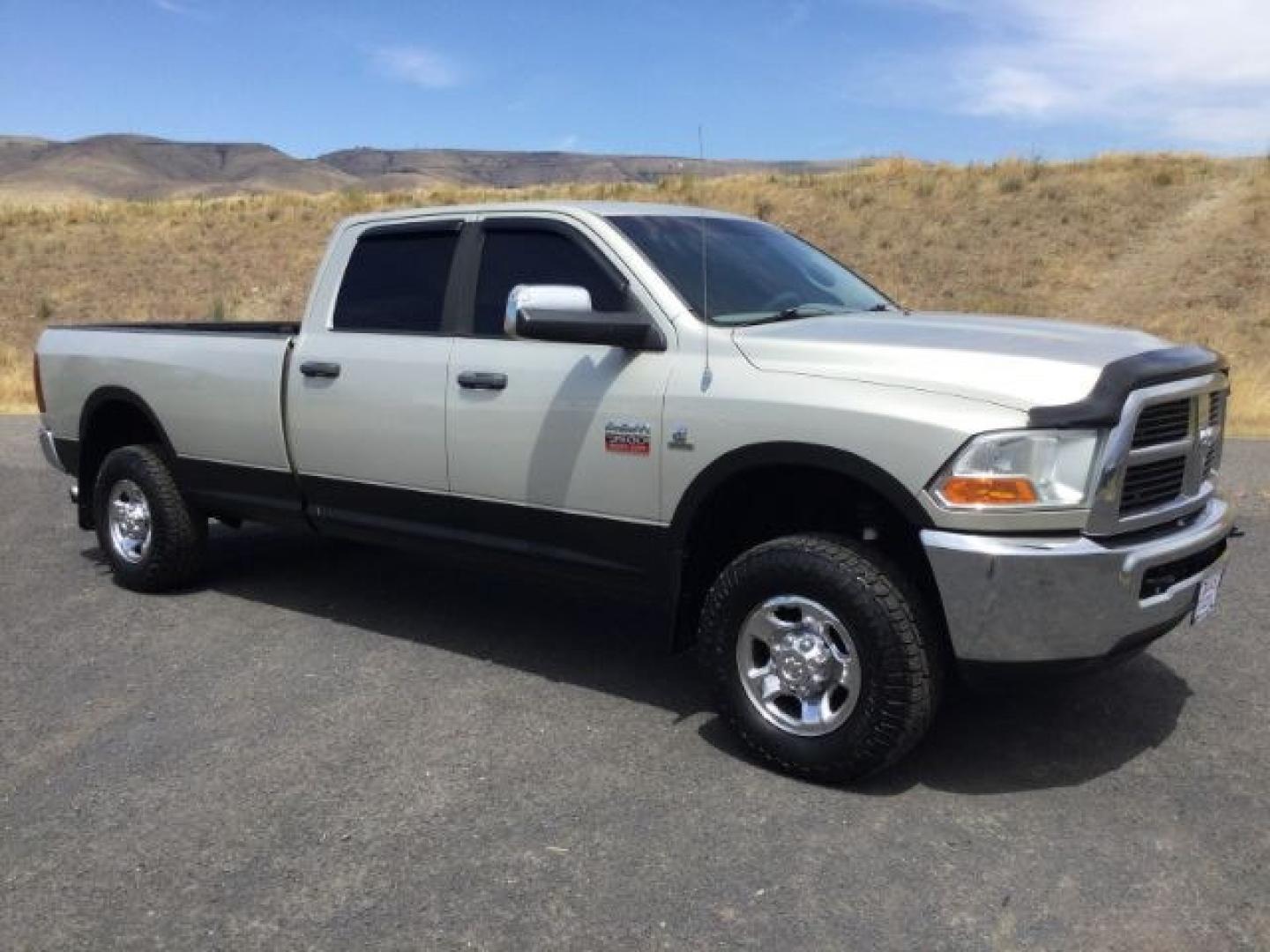 2010 Gold MIst /Black/Gray Cloth RAM 3500 SLT Crew Cab LWB 4WD (3D73Y3CL8AG) with an 6.7L I6 Cummins engine, 6-Speed Automatic transmission, located at 1801 Main Street, Lewiston, 83501, (208) 743-9371, 46.417065, -117.004799- Photo#0