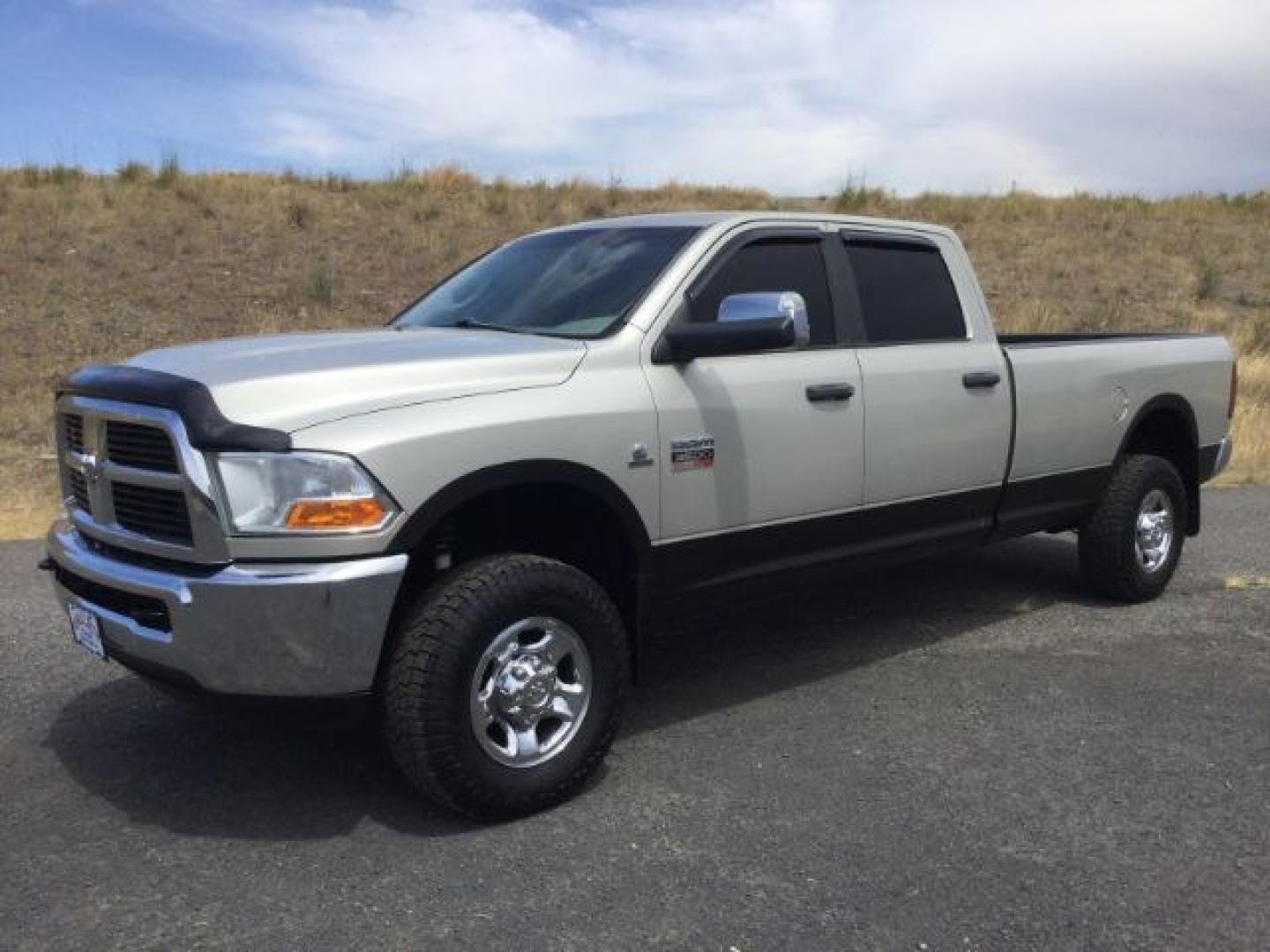 2010 Gold MIst /Black/Gray Cloth RAM 3500 SLT Crew Cab LWB 4WD (3D73Y3CL8AG) with an 6.7L I6 Cummins engine, 6-Speed Automatic transmission, located at 1801 Main Street, Lewiston, 83501, (208) 743-9371, 46.417065, -117.004799- Photo#1