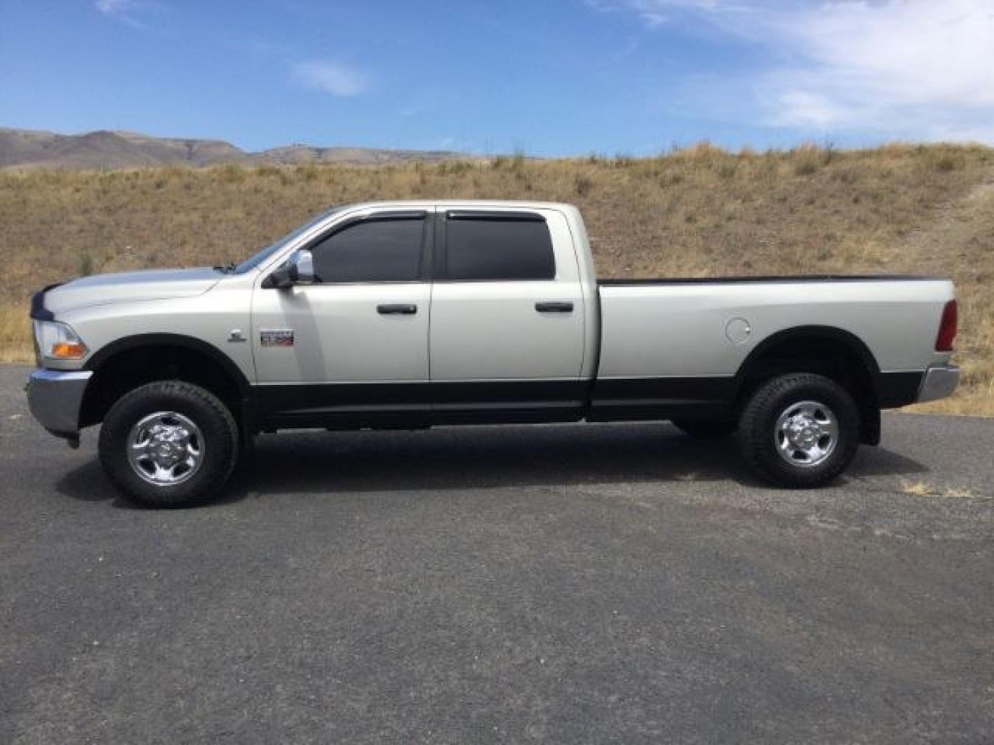 2010 Gold MIst /Black/Gray Cloth RAM 3500 SLT Crew Cab LWB 4WD (3D73Y3CL8AG) with an 6.7L I6 Cummins engine, 6-Speed Automatic transmission, located at 1801 Main Street, Lewiston, 83501, (208) 743-9371, 46.417065, -117.004799- Photo#2