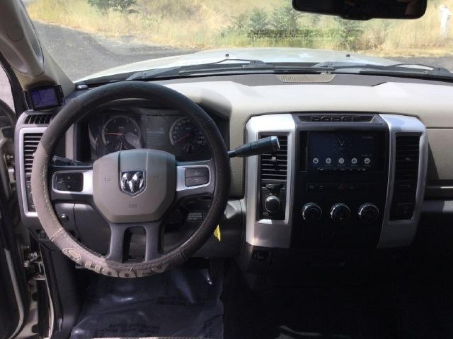 2010 Gold MIst /Black/Gray Cloth RAM 3500 SLT Crew Cab LWB 4WD (3D73Y3CL8AG) with an 6.7L I6 Cummins engine, 6-Speed Automatic transmission, located at 1801 Main Street, Lewiston, 83501, (208) 743-9371, 46.417065, -117.004799- Photo#5