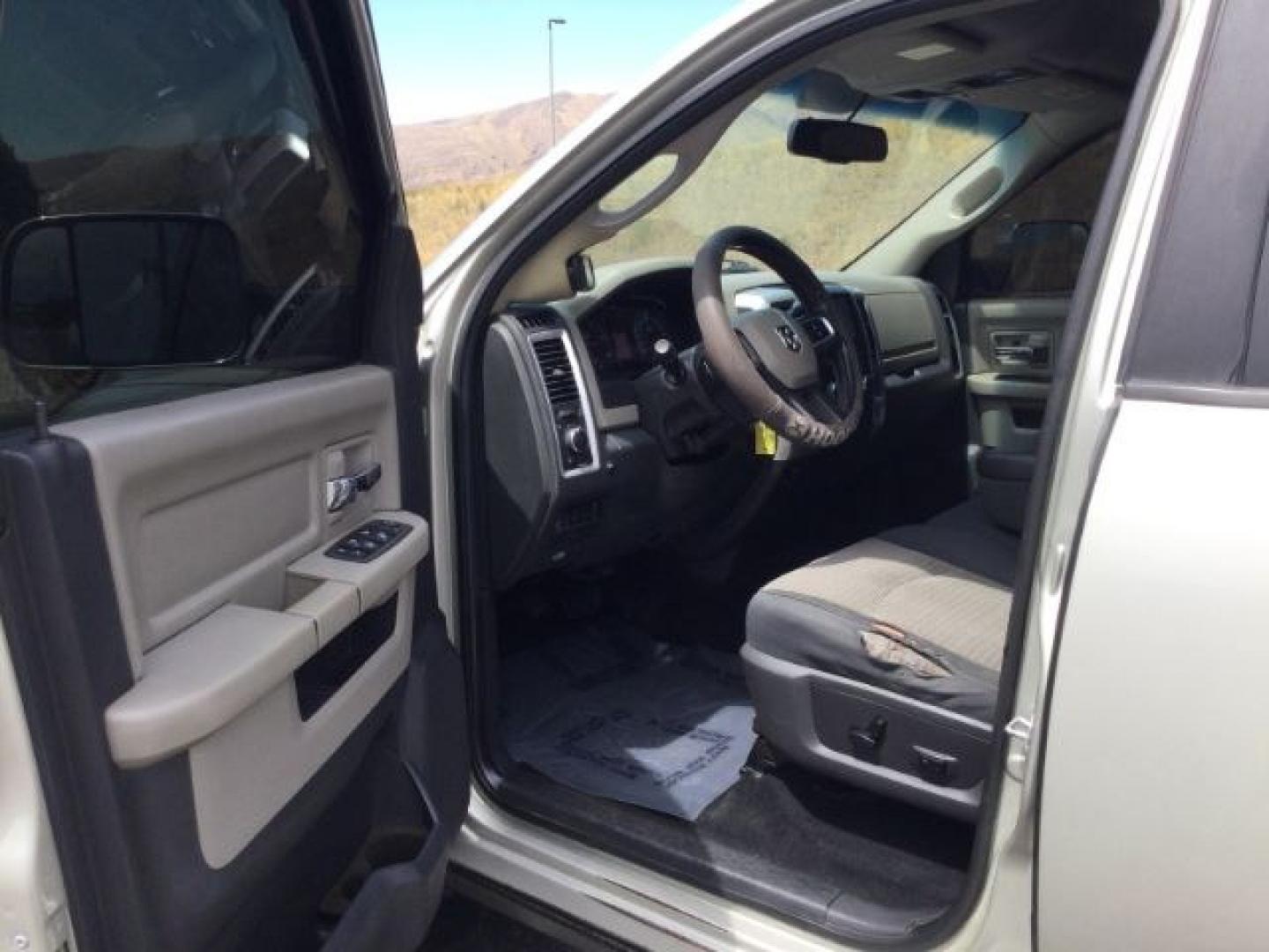 2010 Gold MIst /Black/Gray Cloth RAM 3500 SLT Crew Cab LWB 4WD (3D73Y3CL8AG) with an 6.7L I6 Cummins engine, 6-Speed Automatic transmission, located at 1801 Main Street, Lewiston, 83501, (208) 743-9371, 46.417065, -117.004799- Photo#7