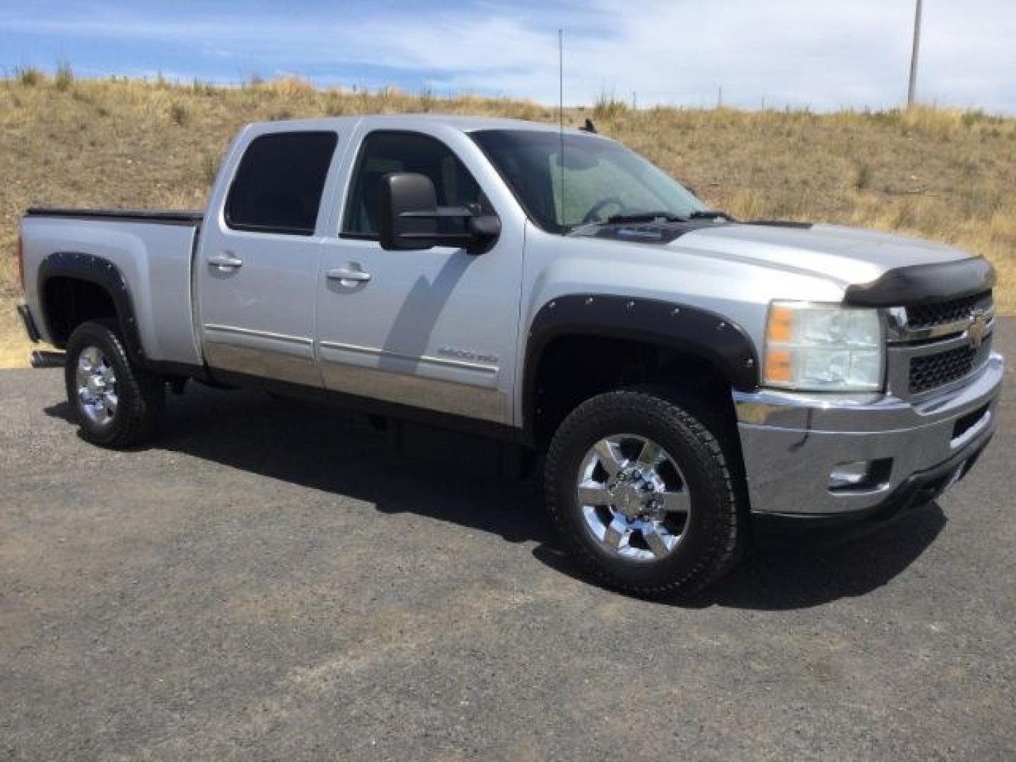 2011 Sheer Silver Metallic /Ebony Leather Interior Chevrolet Silverado 3500HD LTZ Crew Cab 4WD (1GC4K1C87BF) with an 6.6L V8 OHV 32V TURBO DIESEL engine, 6-Speed Automatic transmission, located at 1801 Main Street, Lewiston, 83501, (208) 743-9371, 46.417065, -117.004799- Photo#1