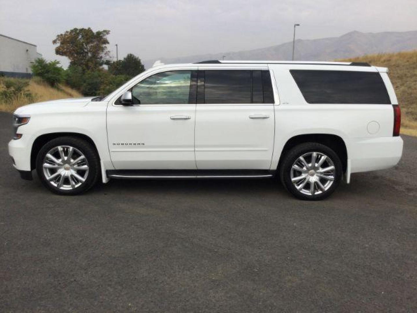 2016 Summit White /Jet Black, premium leather Chevrolet Suburban LTZ 4WD (1GNSKJKC6GR) with an 5.3L V8 OHV 16V engine, 6-Speed Automatic transmission, located at 1801 Main Street, Lewiston, 83501, (208) 743-9371, 46.417065, -117.004799 - Photo#1