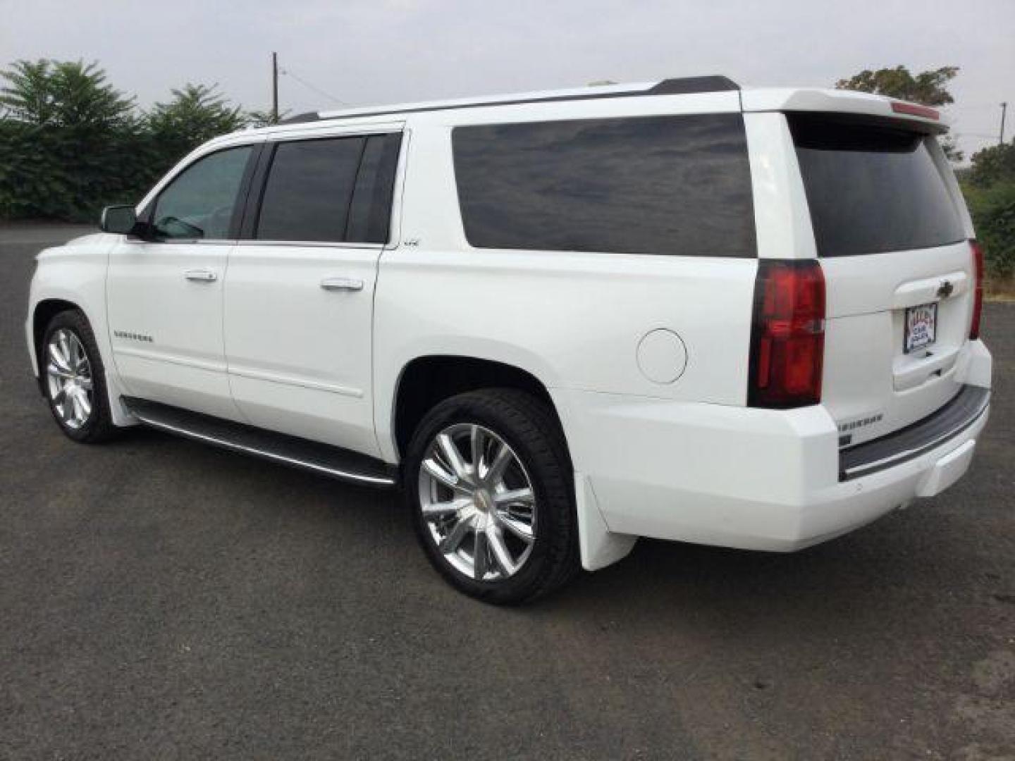 2016 Summit White /Jet Black, premium leather Chevrolet Suburban LTZ 4WD (1GNSKJKC6GR) with an 5.3L V8 OHV 16V engine, 6-Speed Automatic transmission, located at 1801 Main Street, Lewiston, 83501, (208) 743-9371, 46.417065, -117.004799 - Photo#2