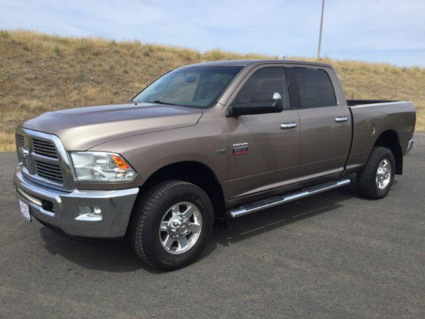 2010 Austin Tan Pearl /Light Pebble Beige/Bark Brown Cloth Interior RAM 2500 SLT Crew Cab SWB 4WD (3D7TT2CT2AG) with an 5.7L V8 OHV 16V engine, 5-Speed Automatic transmission, located at 1801 Main Street, Lewiston, 83501, (208) 743-9371, 46.417065, -117.004799 - Photo#1
