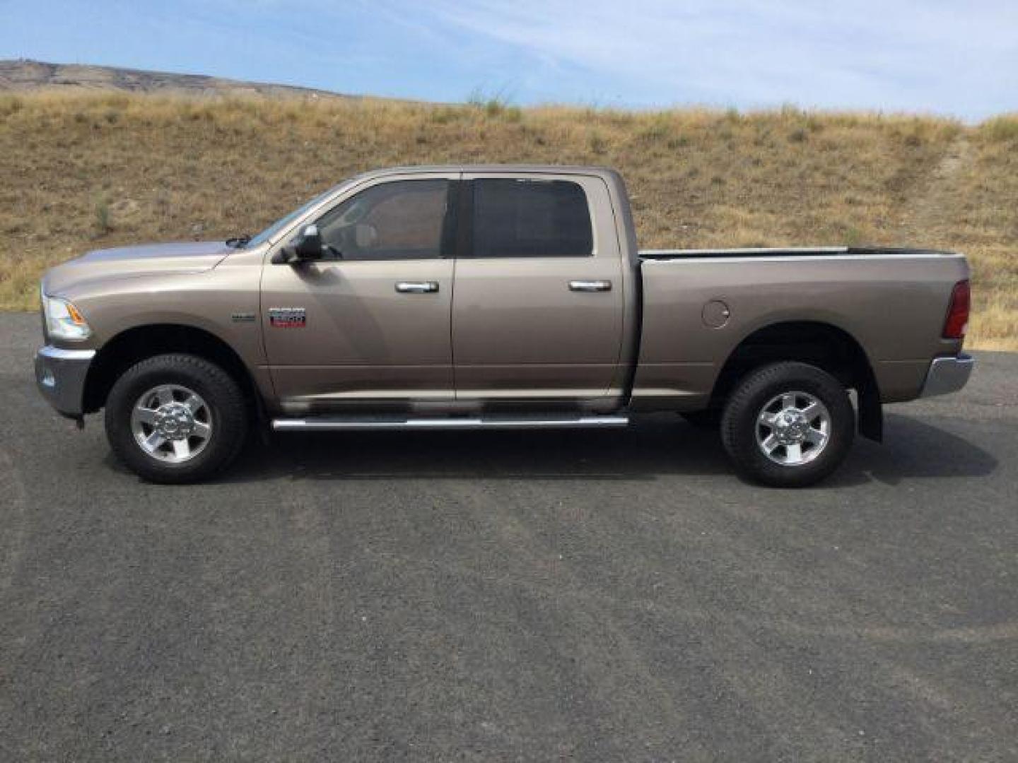 2010 Austin Tan Pearl /Light Pebble Beige/Bark Brown Cloth Interior RAM 2500 SLT Crew Cab SWB 4WD (3D7TT2CT2AG) with an 5.7L V8 OHV 16V engine, 5-Speed Automatic transmission, located at 1801 Main Street, Lewiston, 83501, (208) 743-9371, 46.417065, -117.004799 - Photo#2