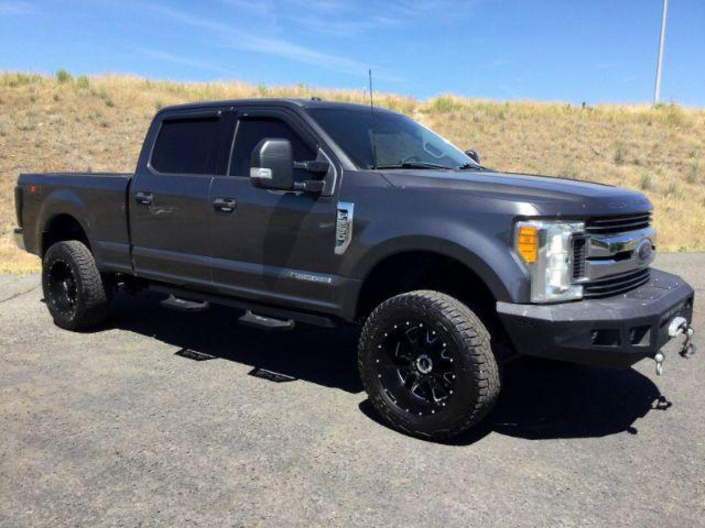 2017 Magnetic Metallic Ford F-250 SD XLT Crew Cab 4WD (1FT7W2BT0HE) with an 6.7L V8 OHV 16V DIESEL engine, 6-Speed Automatic transmission, located at 1801 Main Street, Lewiston, 83501, (208) 743-9371, 46.417065, -117.004799 - Photo#0