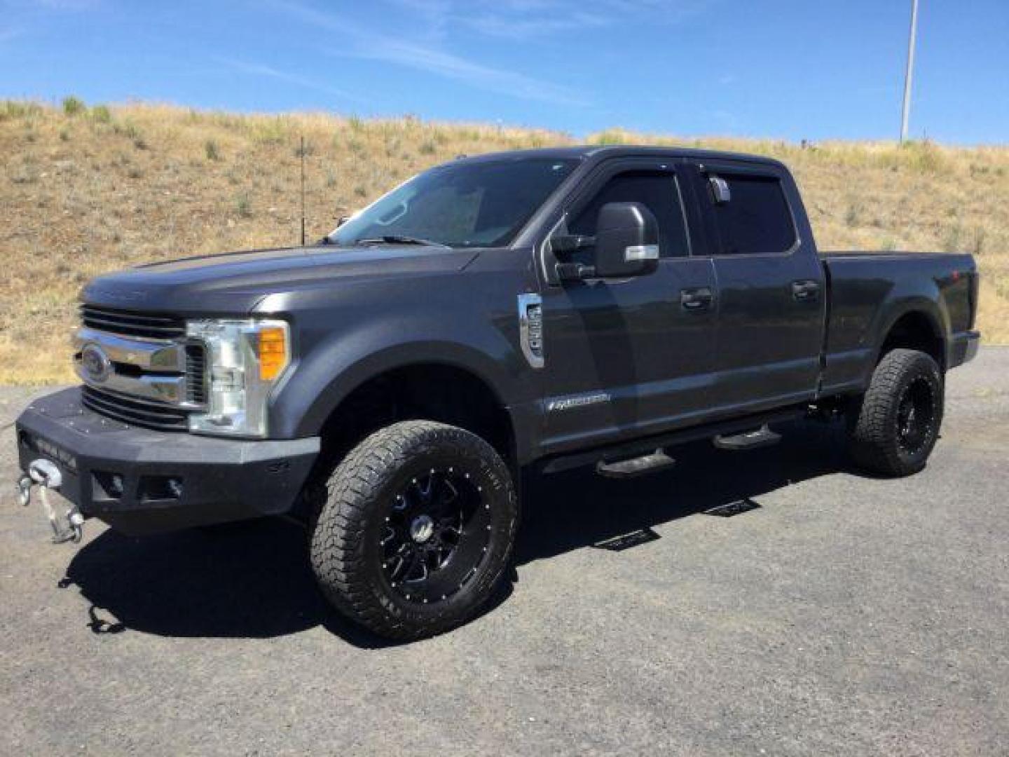 2017 Magnetic Metallic Ford F-250 SD XLT Crew Cab 4WD (1FT7W2BT0HE) with an 6.7L V8 OHV 16V DIESEL engine, 6-Speed Automatic transmission, located at 1801 Main Street, Lewiston, 83501, (208) 743-9371, 46.417065, -117.004799 - Photo#2