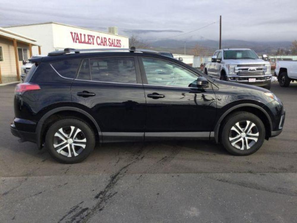 2017 Black /Black, cloth Toyota RAV4 LE AWD (2T3BFREVXHW) with an 2.5L L4 DOHC 16V engine, 6-Speed Automatic transmission, located at 1801 Main Street, Lewiston, 83501, (208) 743-9371, 46.417065, -117.004799 - Photo #14