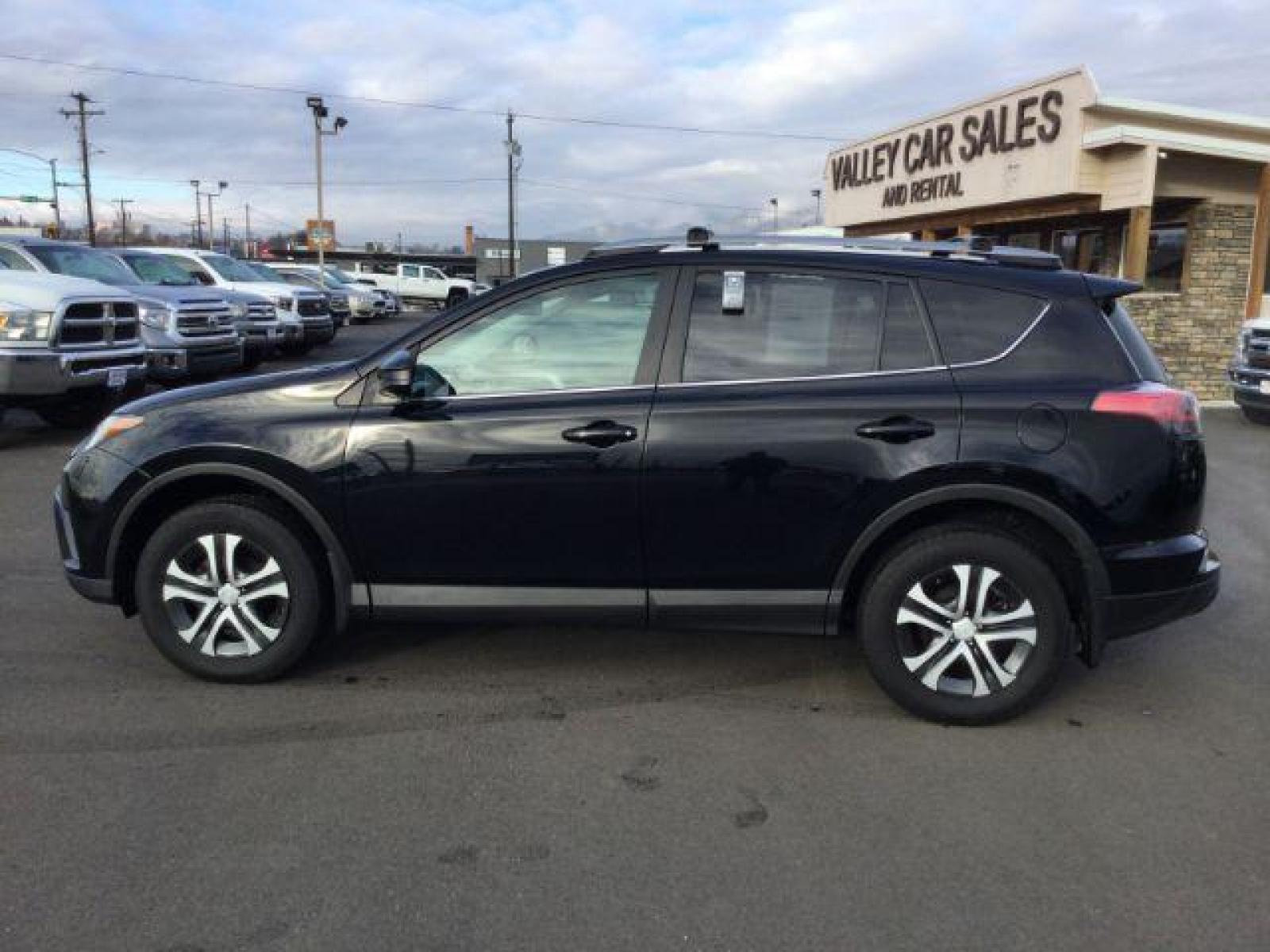 2017 Black /Black, cloth Toyota RAV4 LE AWD (2T3BFREVXHW) with an 2.5L L4 DOHC 16V engine, 6-Speed Automatic transmission, located at 1801 Main Street, Lewiston, 83501, (208) 743-9371, 46.417065, -117.004799 - Photo #1