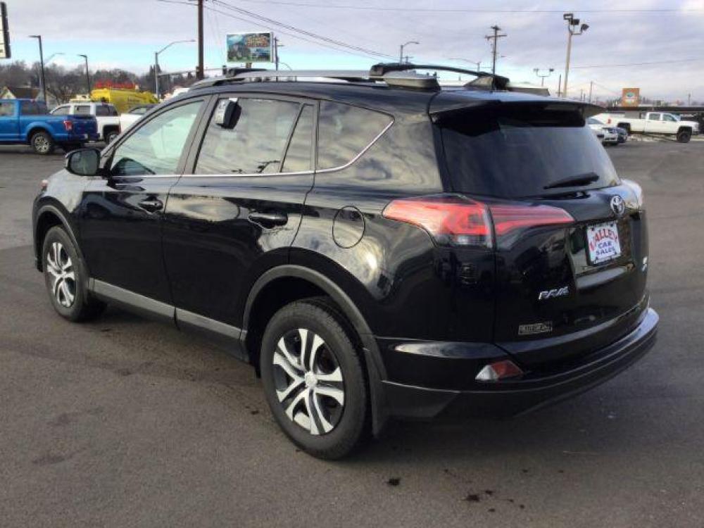 2017 Black /Black, cloth Toyota RAV4 LE AWD (2T3BFREVXHW) with an 2.5L L4 DOHC 16V engine, 6-Speed Automatic transmission, located at 1801 Main Street, Lewiston, 83501, (208) 743-9371, 46.417065, -117.004799 - Photo #2