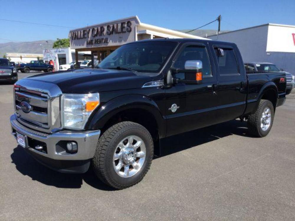 2016 BLACK /BLACK LEATHER Ford F-350 SD Lariat Crew Cab 4WD (1FT8W3BTXGE) with an 6.7L V8 OHV 16V DIESEL engine, 6-Speed Automatic transmission, located at 1801 Main Street, Lewiston, 83501, (208) 743-9371, 46.417065, -117.004799 - Photo #0