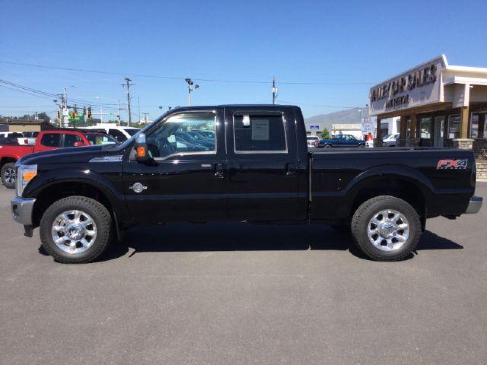2016 BLACK /BLACK LEATHER Ford F-350 SD Lariat Crew Cab 4WD (1FT8W3BTXGE) with an 6.7L V8 OHV 16V DIESEL engine, 6-Speed Automatic transmission, located at 1801 Main Street, Lewiston, 83501, (208) 743-9371, 46.417065, -117.004799 - Photo #1