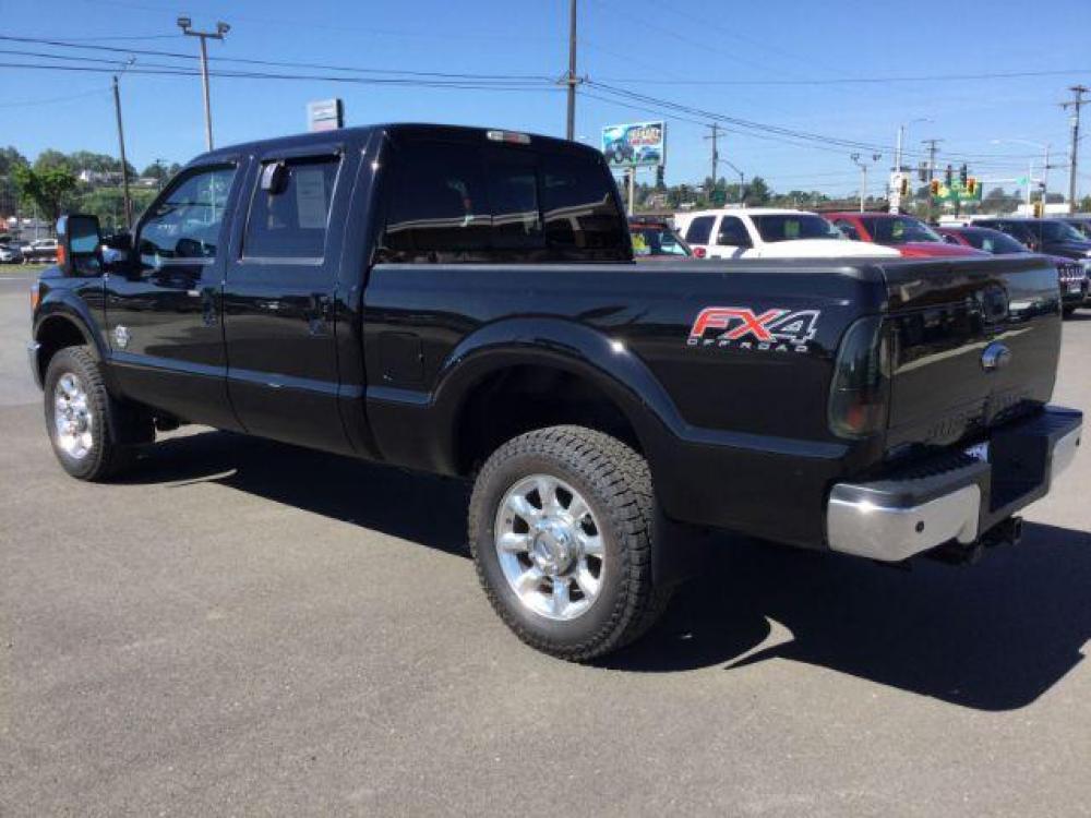 2016 BLACK /BLACK LEATHER Ford F-350 SD Lariat Crew Cab 4WD (1FT8W3BTXGE) with an 6.7L V8 OHV 16V DIESEL engine, 6-Speed Automatic transmission, located at 1801 Main Street, Lewiston, 83501, (208) 743-9371, 46.417065, -117.004799 - Photo #2