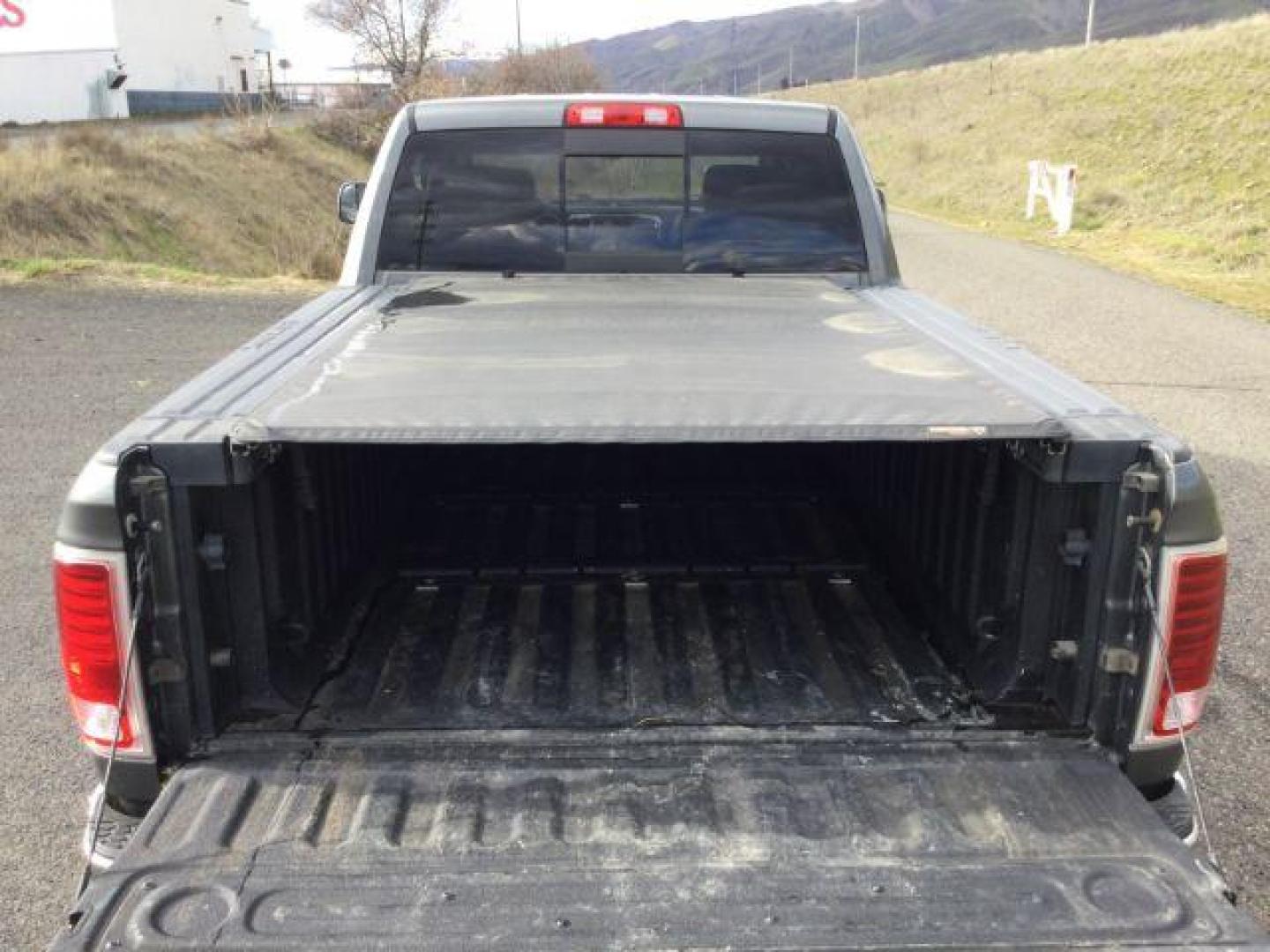 2013 Mineral Gray Metallic CC /Black RAM 2500 Laramie Crew Cab SWB 4WD (3C6UR5FL7DG) with an 6.7L L6 OHV 24V TURBO DIESEL engine, 6-Speed Automatic transmission, located at 1801 Main Street, Lewiston, 83501, (208) 743-9371, 46.417065, -117.004799 - Photo#8