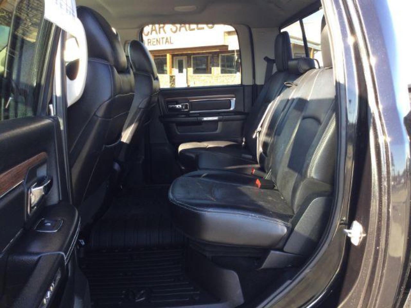 2016 Brilliant Black Crystal Pearl Coat /Black, leather RAM 2500 Laramie Crew Cab SWB 4WD (3C6UR5FL4GG) with an 6.7L L6 OHV 24V TURBO DIESEL engine, 6-Speed Automatic transmission, located at 1801 Main Street, Lewiston, 83501, (208) 743-9371, 46.417065, -117.004799 - Photo #6