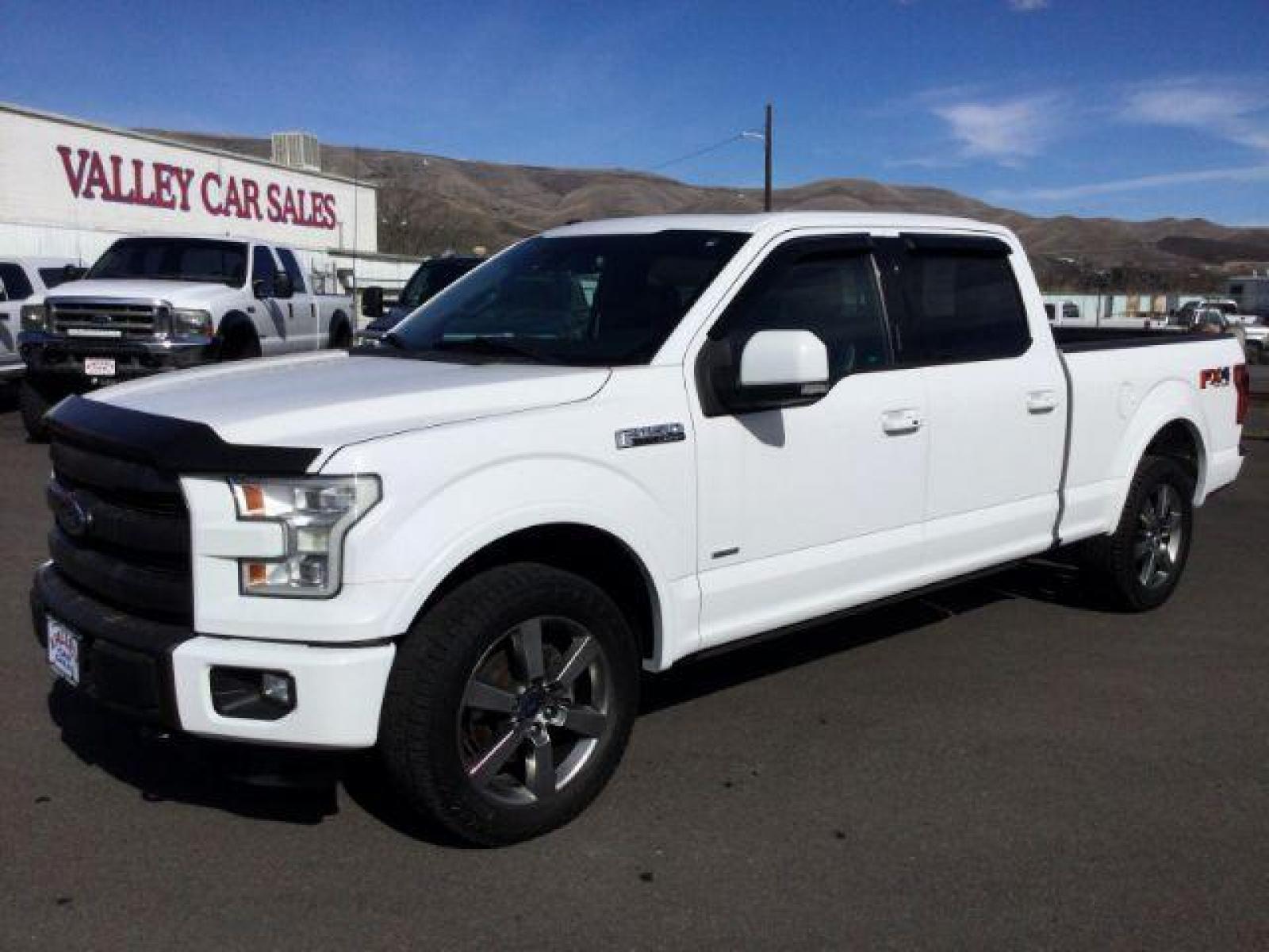2015 Oxford White /black leather Ford F-150 Lariat SuperCrew 6.5-ft. Bed 4WD (1FTFW1EG7FF) with an 3.5 V6 engine, 6-Speed Automatic transmission, located at 1801 Main Street, Lewiston, 83501, (208) 743-9371, 46.417065, -117.004799 - Photo #0