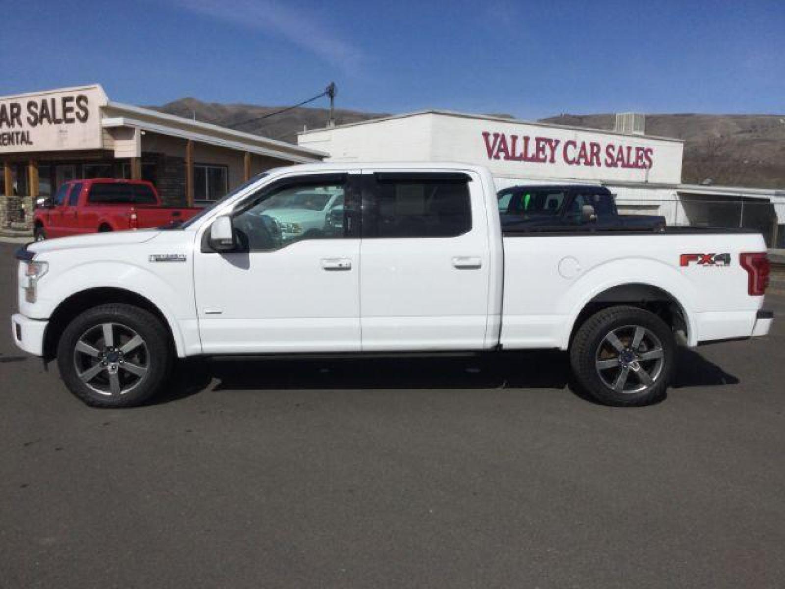 2015 Oxford White /black leather Ford F-150 Lariat SuperCrew 6.5-ft. Bed 4WD (1FTFW1EG7FF) with an 3.5 V6 engine, 6-Speed Automatic transmission, located at 1801 Main Street, Lewiston, 83501, (208) 743-9371, 46.417065, -117.004799 - Photo #1