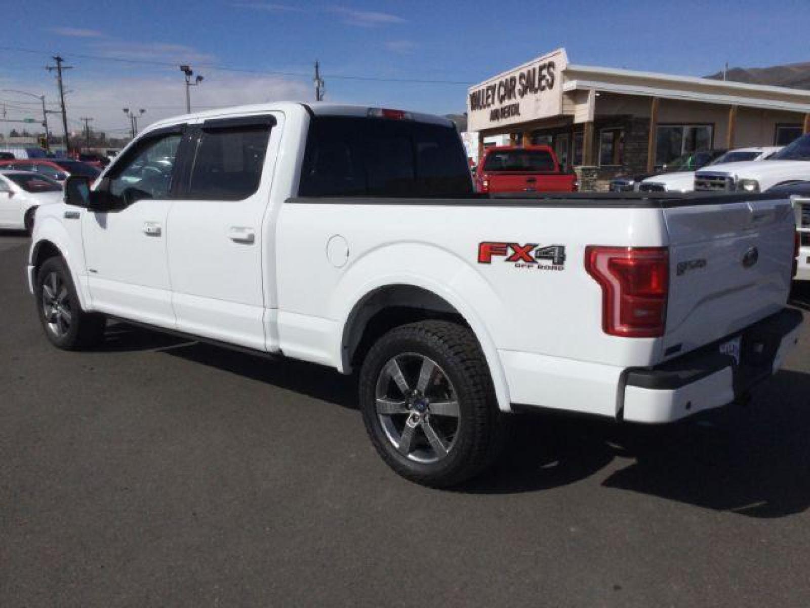 2015 Oxford White /black leather Ford F-150 Lariat SuperCrew 6.5-ft. Bed 4WD (1FTFW1EG7FF) with an 3.5 V6 engine, 6-Speed Automatic transmission, located at 1801 Main Street, Lewiston, 83501, (208) 743-9371, 46.417065, -117.004799 - Photo #2
