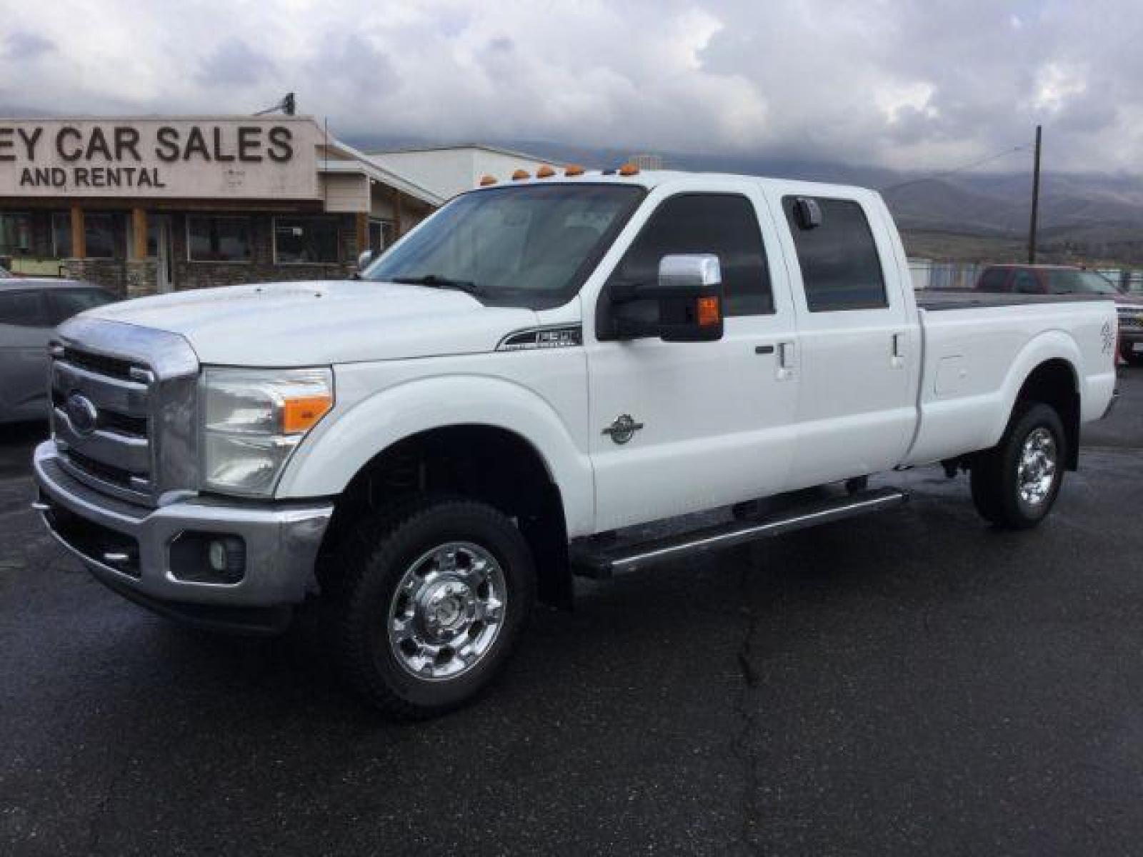 2014 Oxford White /BLACK LEATHER Ford F-350 SD Lariat Crew Cab Long Bed 4WD (1FT8W3BT2EE) with an 6.7L V8 OHV 16V DIESEL engine, 6-Speed Automatic transmission, located at 1801 Main Street, Lewiston, 83501, (208) 743-9371, 46.417065, -117.004799 - Photo #0