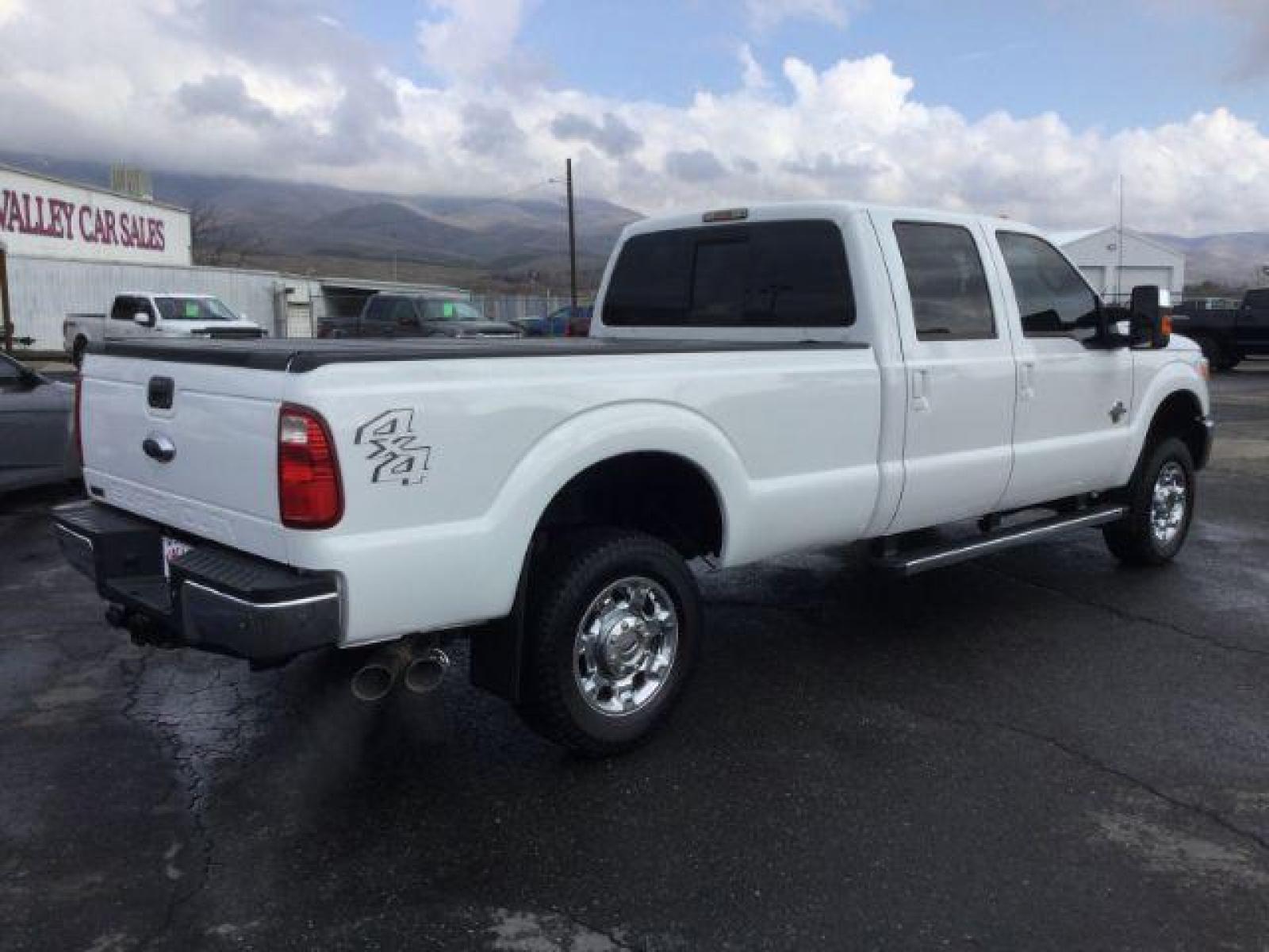 2014 Oxford White /BLACK LEATHER Ford F-350 SD Lariat Crew Cab Long Bed 4WD (1FT8W3BT2EE) with an 6.7L V8 OHV 16V DIESEL engine, 6-Speed Automatic transmission, located at 1801 Main Street, Lewiston, 83501, (208) 743-9371, 46.417065, -117.004799 - Photo #12