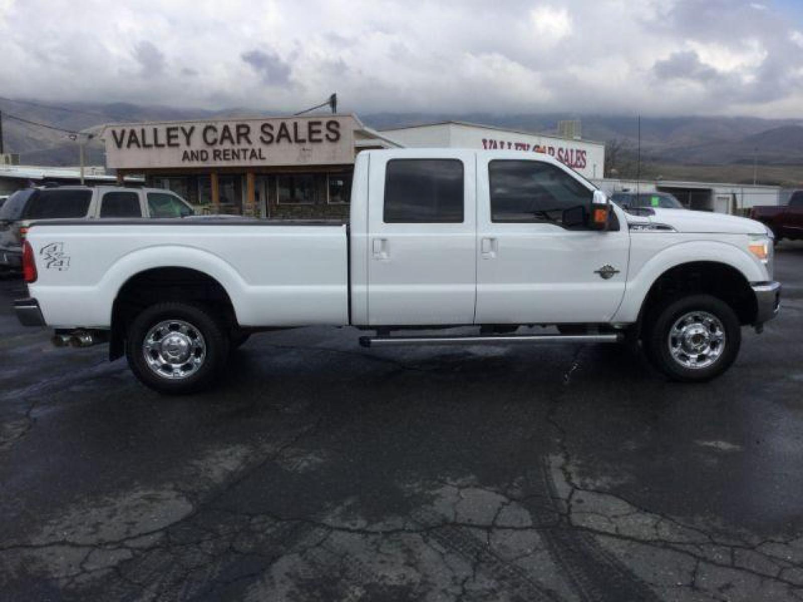 2014 Oxford White /BLACK LEATHER Ford F-350 SD Lariat Crew Cab Long Bed 4WD (1FT8W3BT2EE) with an 6.7L V8 OHV 16V DIESEL engine, 6-Speed Automatic transmission, located at 1801 Main Street, Lewiston, 83501, (208) 743-9371, 46.417065, -117.004799 - Photo #13