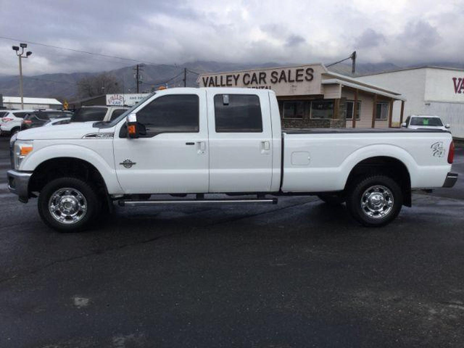 2014 Oxford White /BLACK LEATHER Ford F-350 SD Lariat Crew Cab Long Bed 4WD (1FT8W3BT2EE) with an 6.7L V8 OHV 16V DIESEL engine, 6-Speed Automatic transmission, located at 1801 Main Street, Lewiston, 83501, (208) 743-9371, 46.417065, -117.004799 - Photo #1