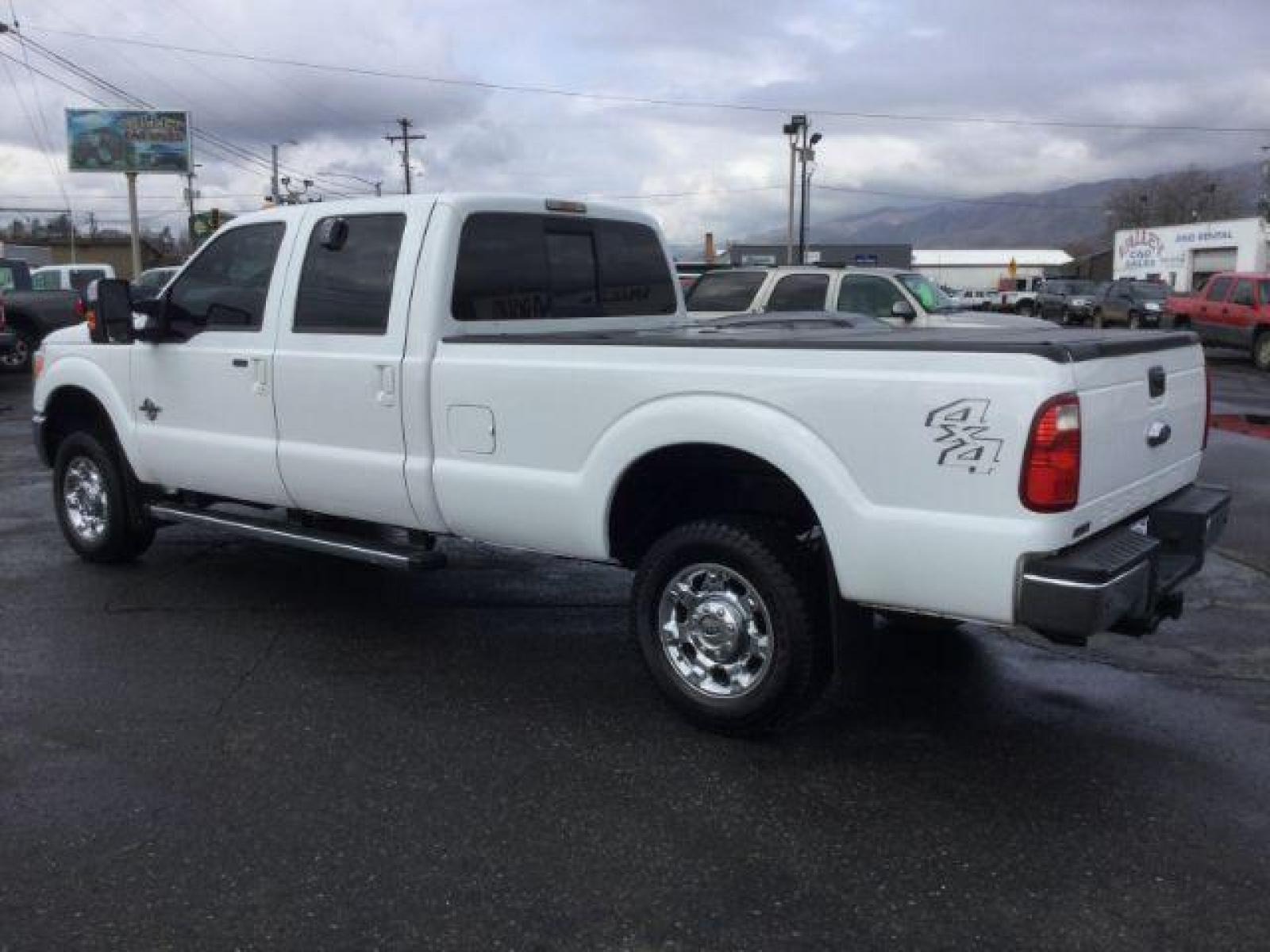 2014 Oxford White /BLACK LEATHER Ford F-350 SD Lariat Crew Cab Long Bed 4WD (1FT8W3BT2EE) with an 6.7L V8 OHV 16V DIESEL engine, 6-Speed Automatic transmission, located at 1801 Main Street, Lewiston, 83501, (208) 743-9371, 46.417065, -117.004799 - Photo #2